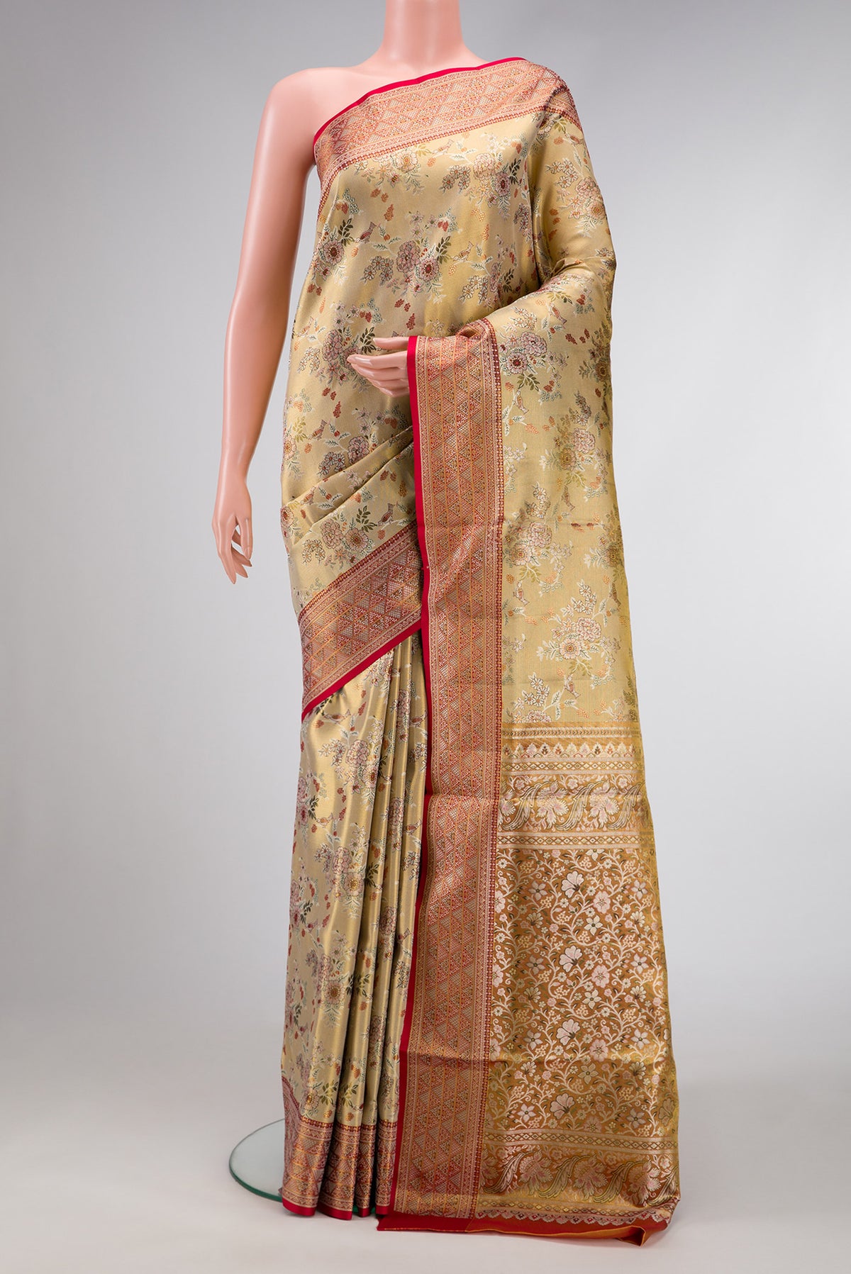 Gold Dual Tone Kanchipuram Tissue Silk Saree with Zari Brocade on the body and Zari Border.  displayed on a mannequin