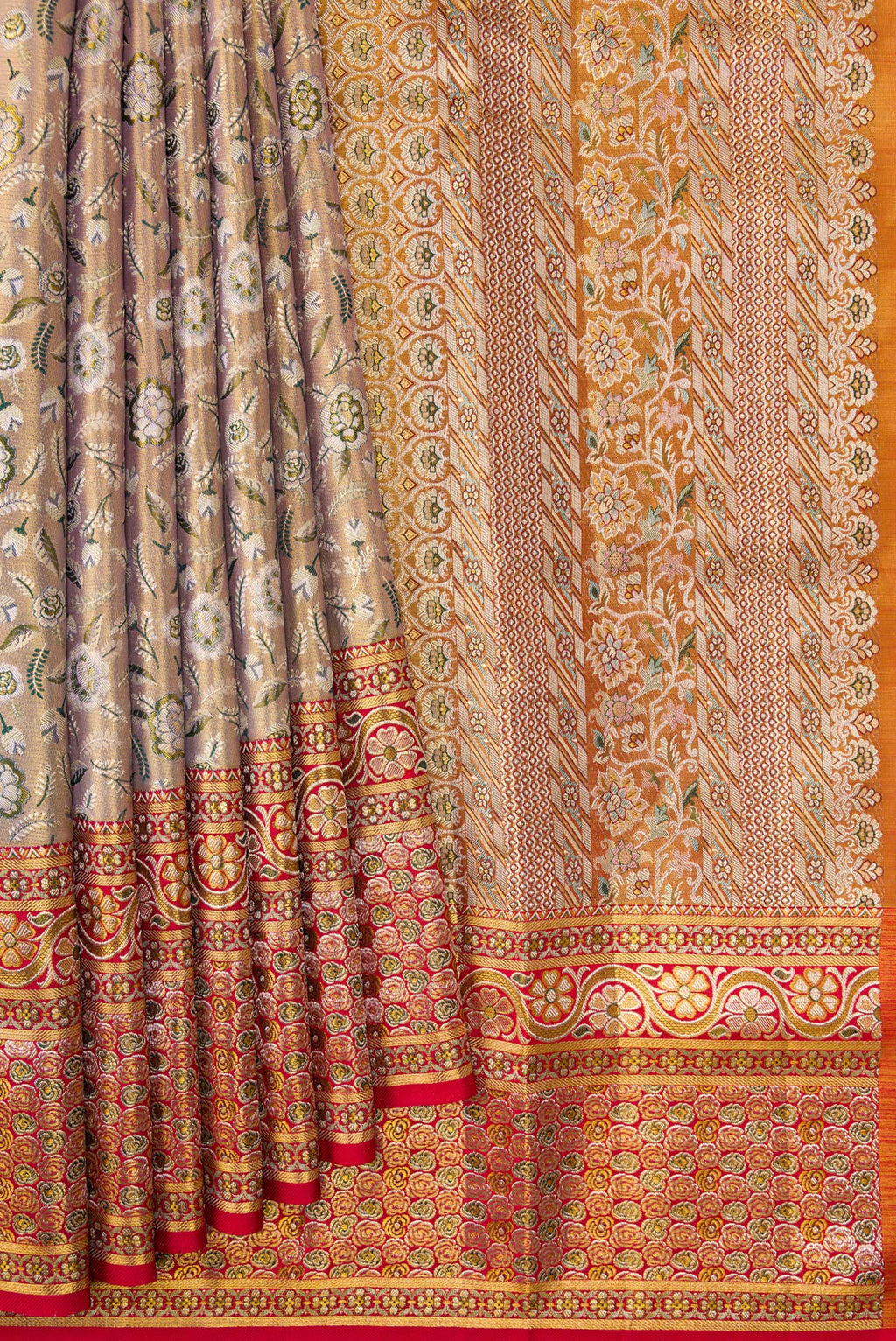 Pleats and pallu of Gold Dual Tone Kanchipuram Tissue Silk Saree with Zari Brocade on the body and Fancy Border. 