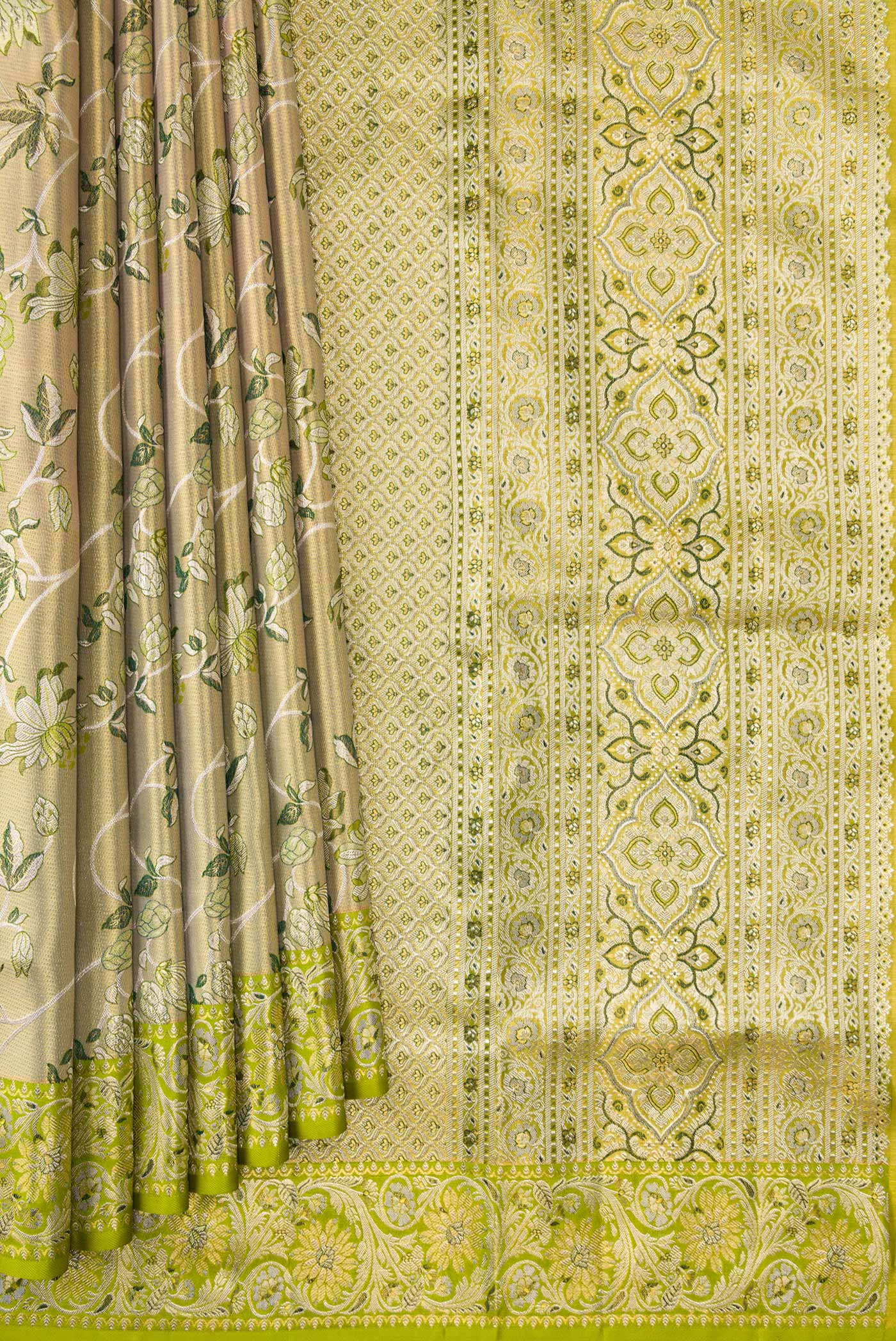 Pleats and pallu of Pista Green Dual Tone Kanchipuram Tissue Silk Saree with Zari Brocade on the body and Fancy Border. 