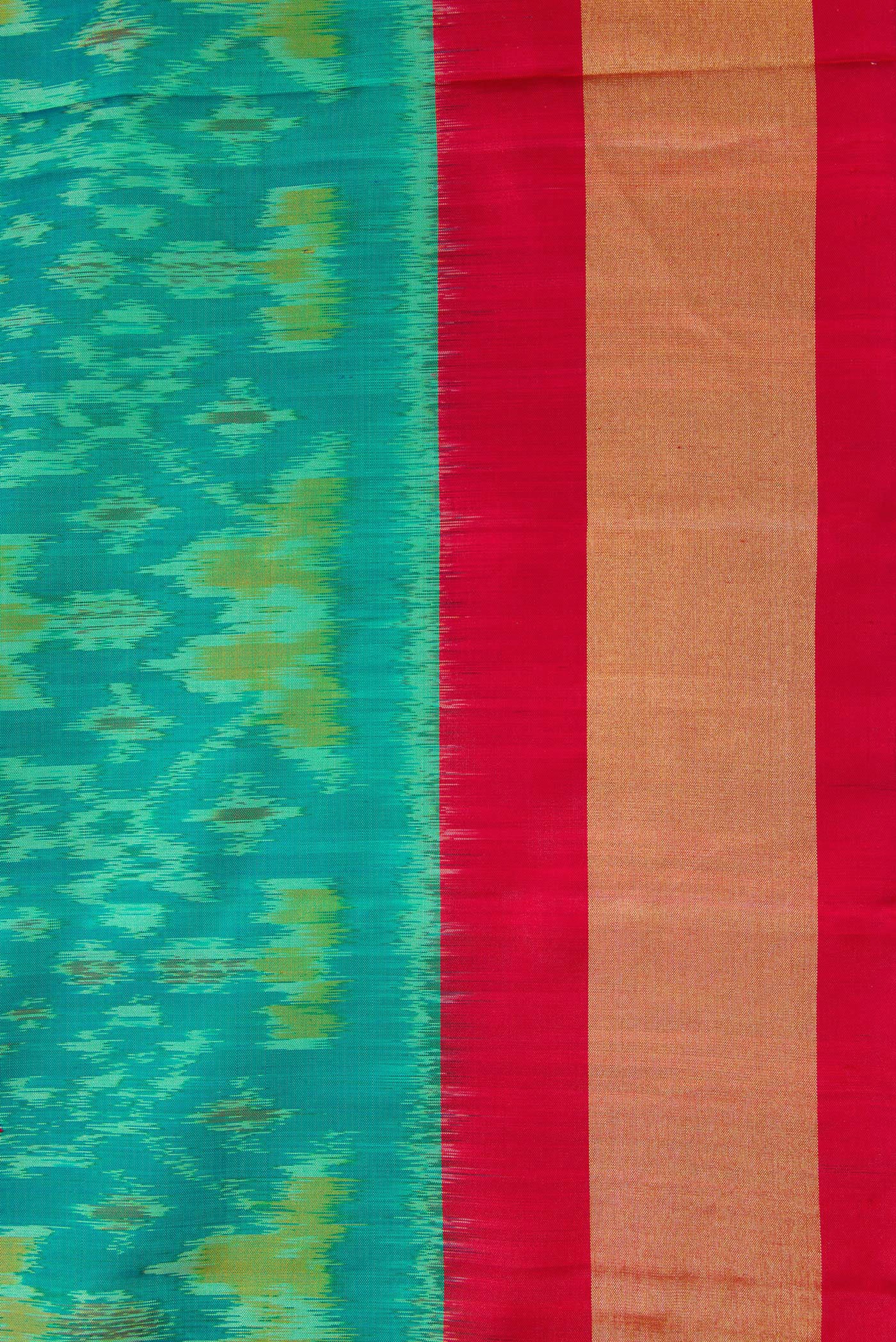 Border image of Sea Green Dual Tone Soft Silk Saree with Ikat Print on the body and Zari Border. 