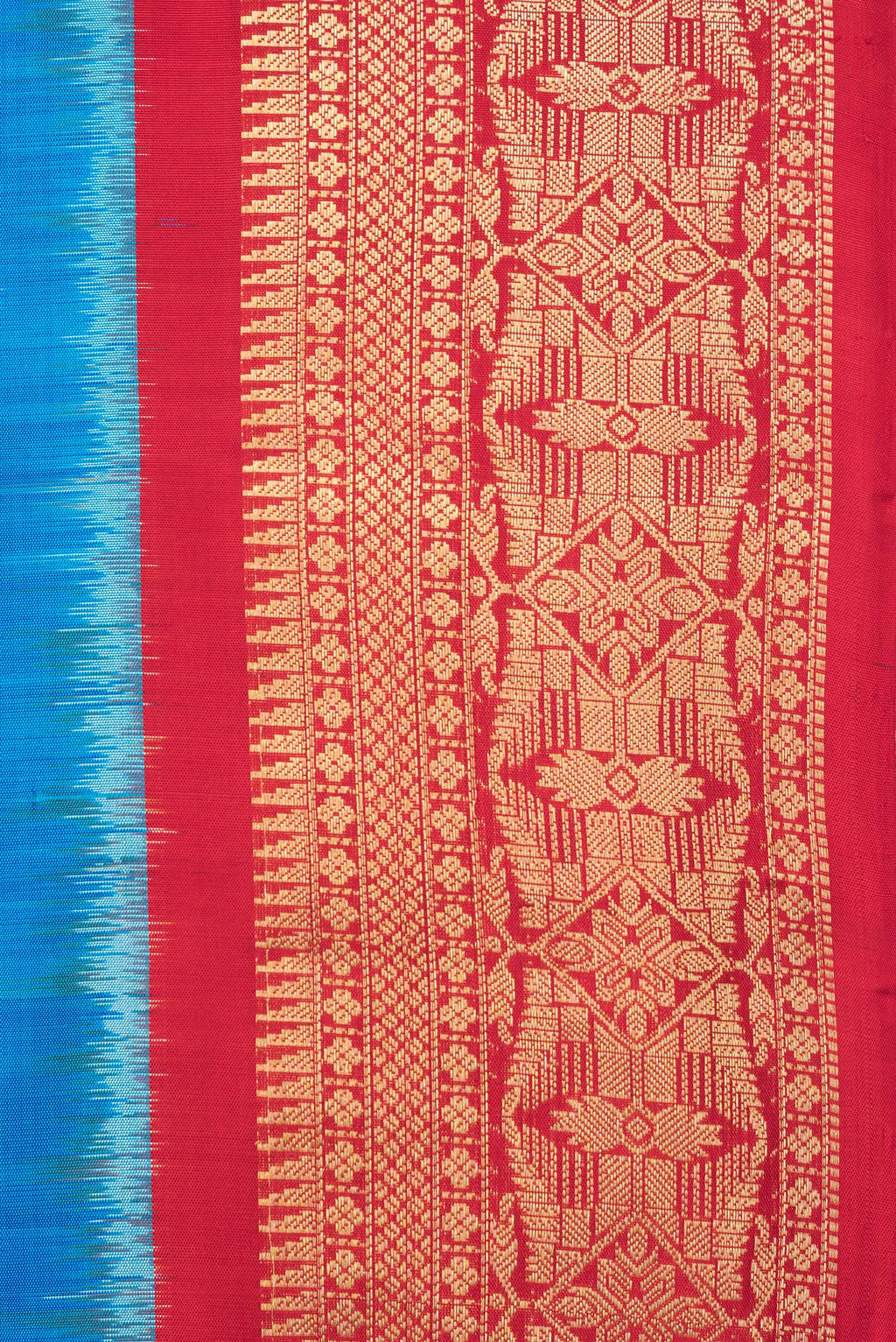 Border image of Pure Silk Peacock Blue Dual Tone Soft Saree with Ikat Print on the body and Zari Border. 