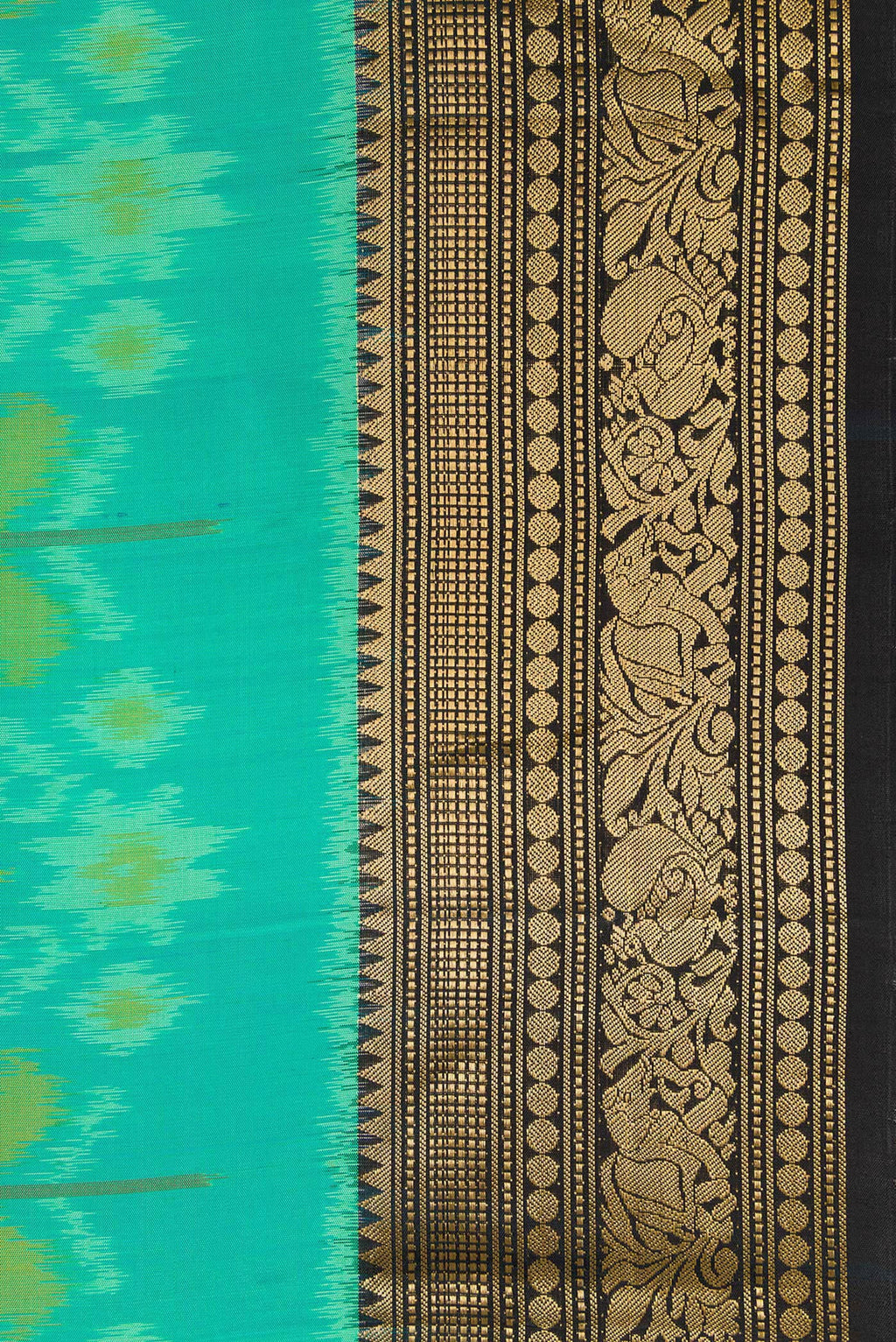 Border image of Sea Green Dual Tone Soft Silk Saree with Ikat Print on the body and Zari Border. 