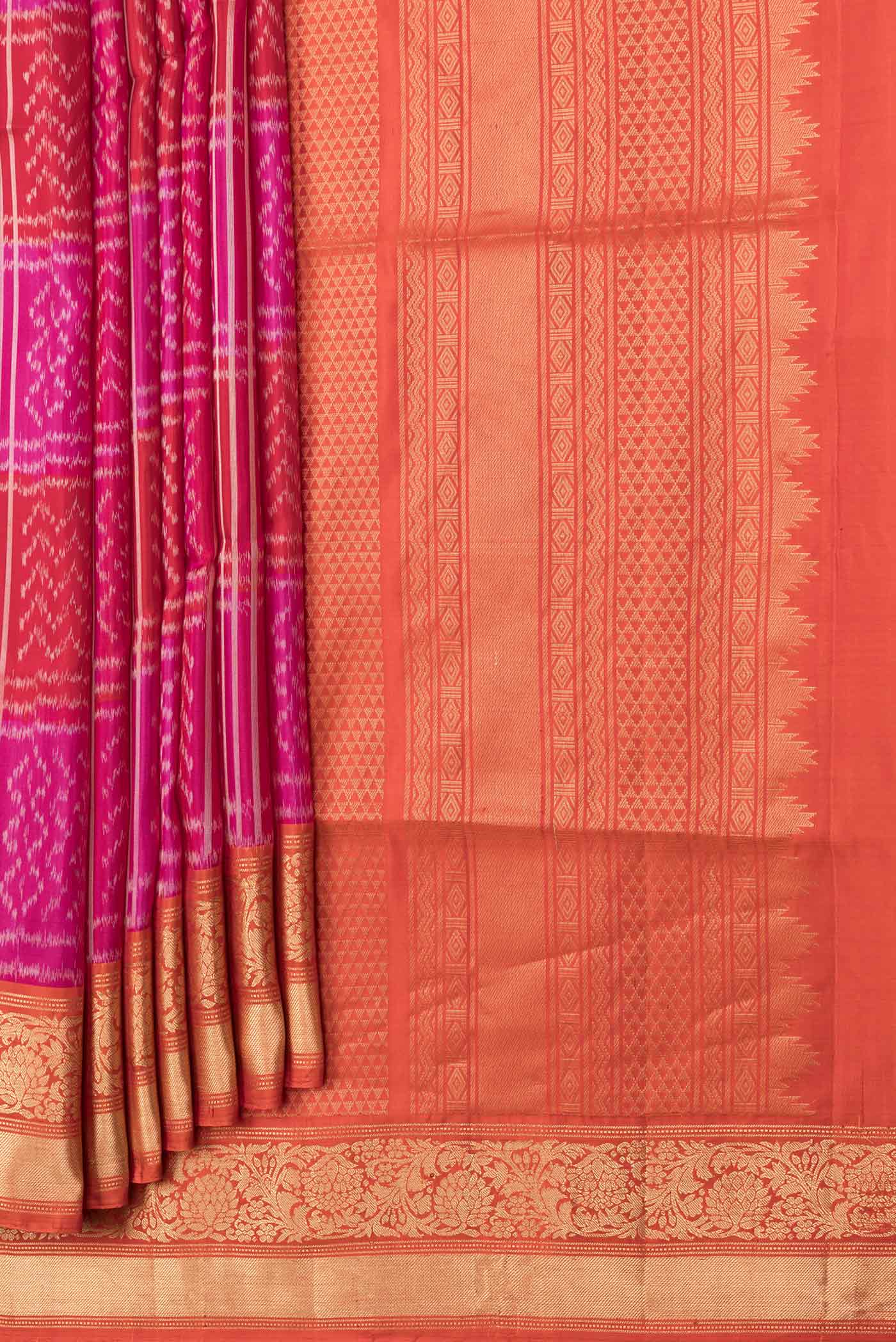Pleats and pallu of Pink Dual Tone Soft Silk Saree with Ikat Print on the body and Zari Border. 