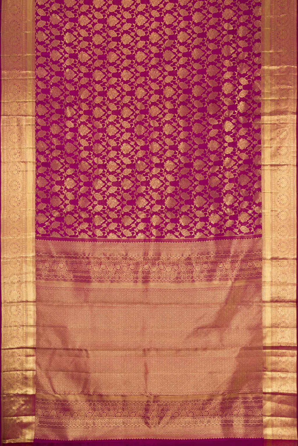 Flat view of Magenta Dual Tone Kanchipuram Silk Saree with Zari Brocade on the body and Zari Border. 
