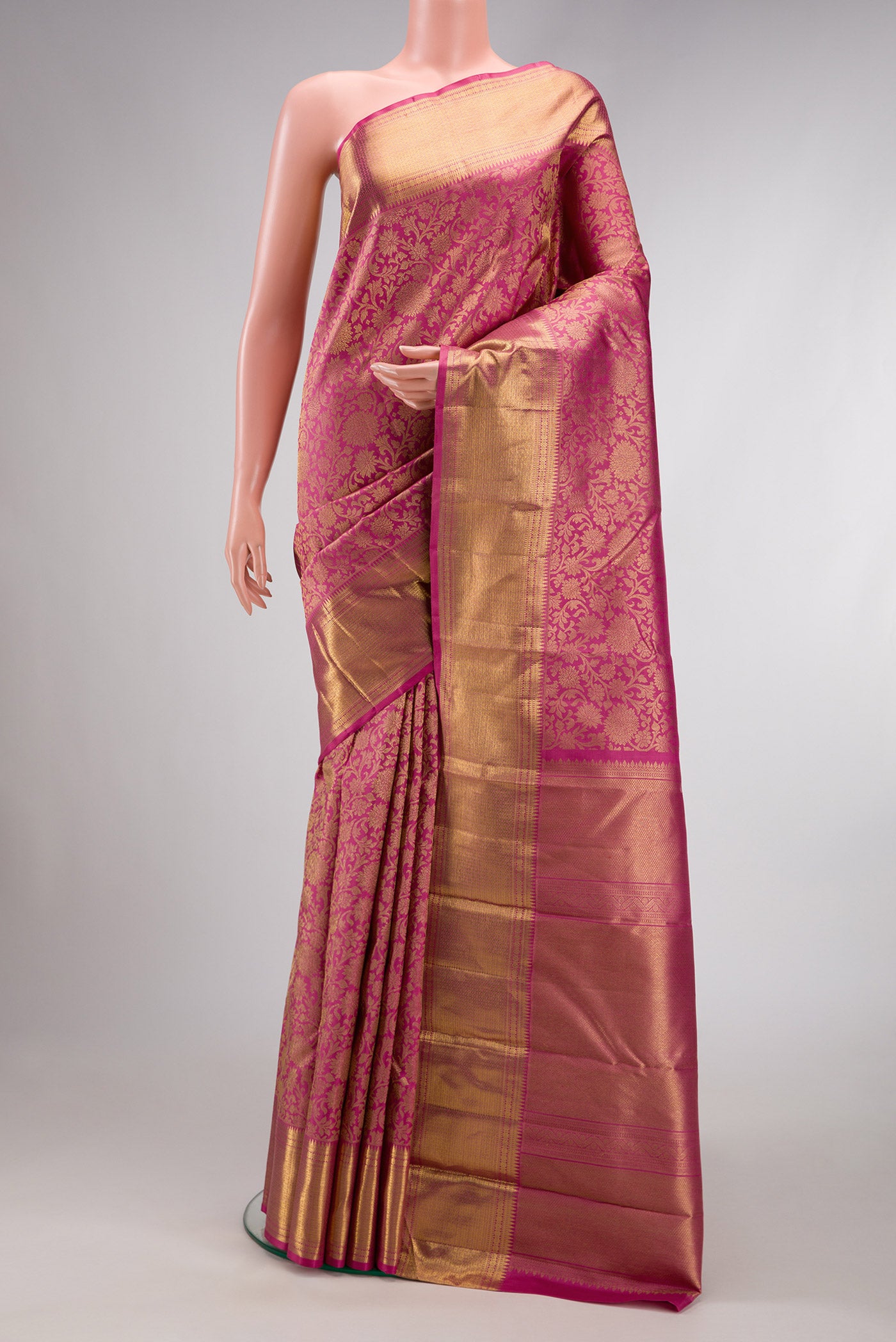 Mauve Dual Tone Kanjivaram Silk Saree with Zari Brocade on the body and Zari Border.  displayed on a mannequin