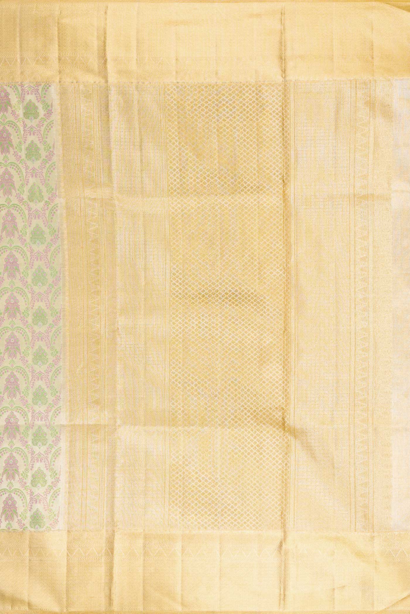 Close up image of the pallu of Silver Dual Tone Kanjivaram Tissue Silk Saree with Zari Brocade on the body and Zari Border. 