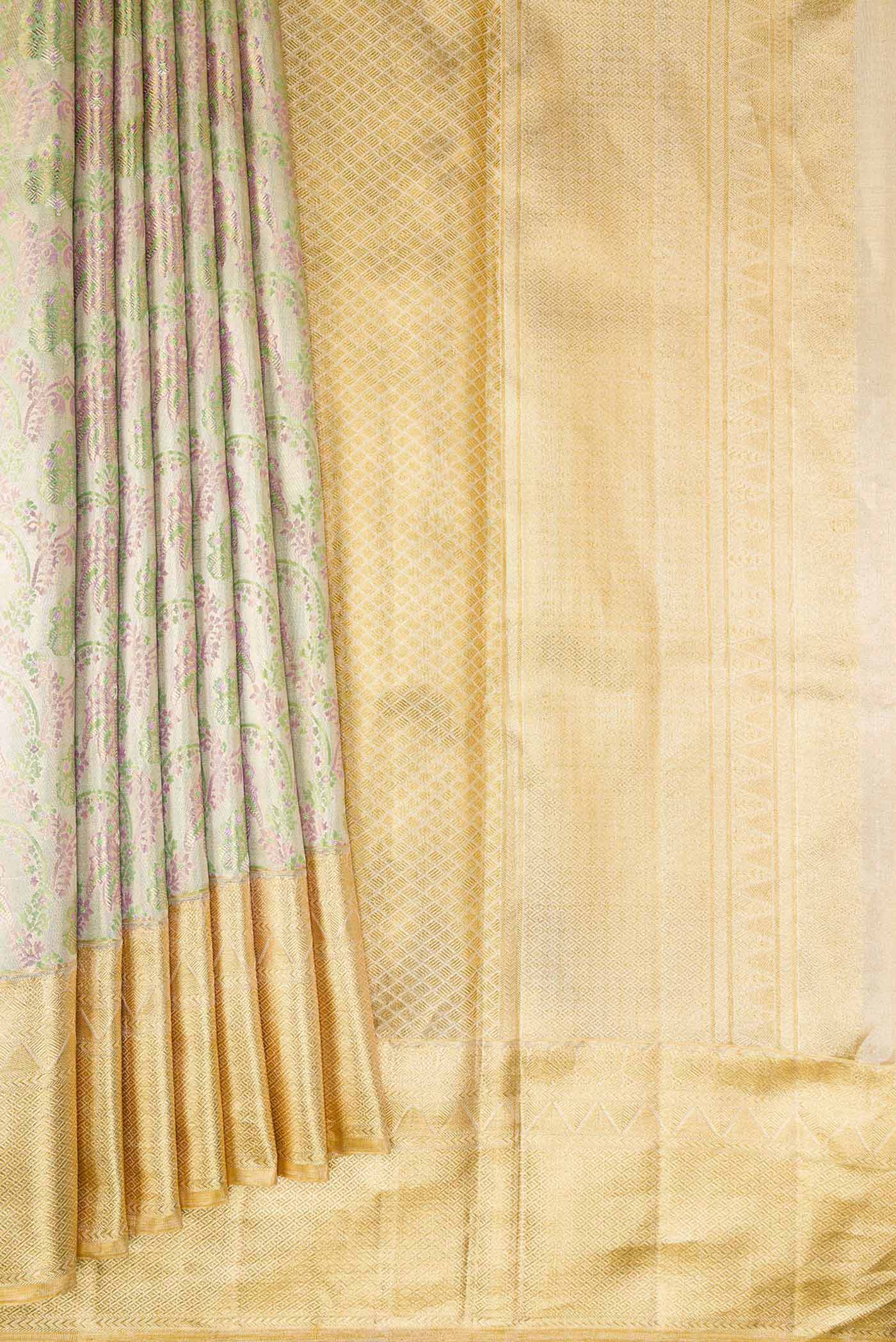 Pleats and pallu of Silver Dual Tone Kanjivaram Tissue Silk Saree with Zari Brocade on the body and Zari Border. 