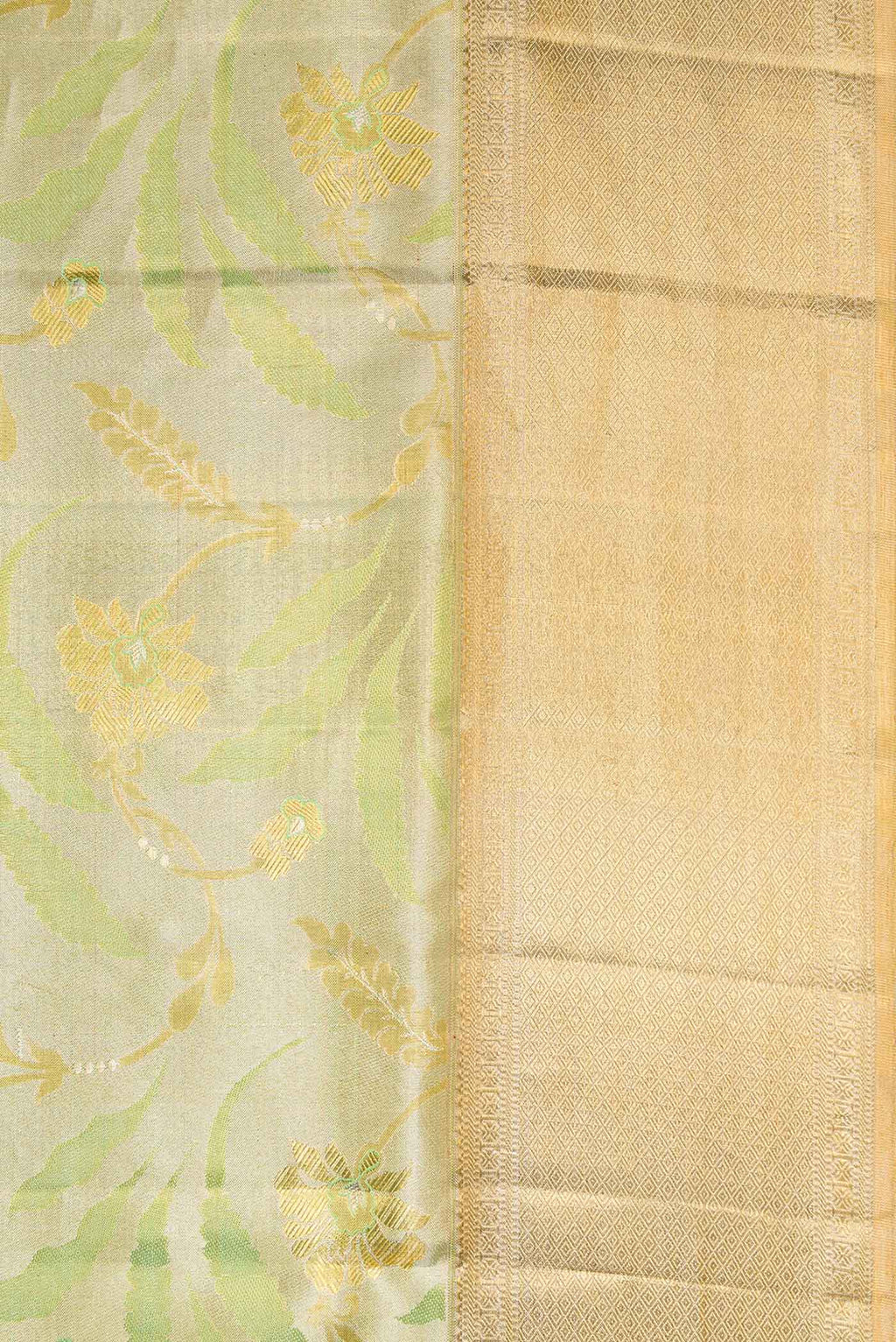 Border image of Pista Green Dual Tone Kanjivaram Tissue Silk Saree with Zari Brocade on the body and Zari Border. 