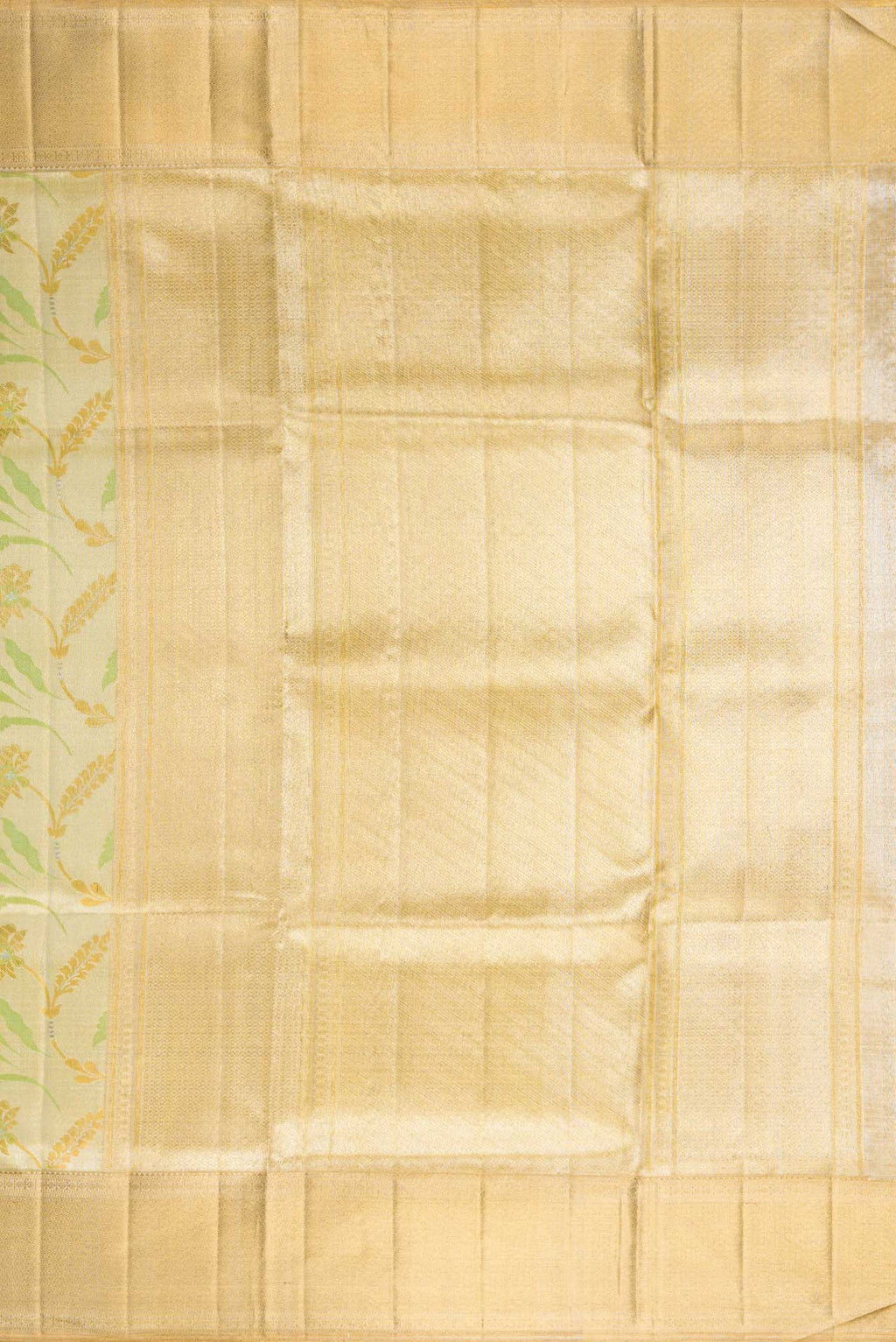 Close up image of the pallu of Pista Green Dual Tone Kanjivaram Tissue Silk Saree with Zari Brocade on the body and Zari Border. 