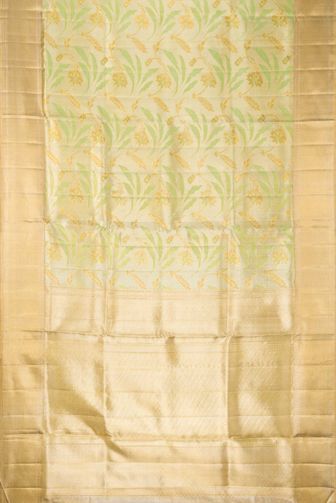 Flat view of Pista Green Dual Tone Kanjivaram Tissue Silk Saree with Zari Brocade on the body and Zari Border. 
