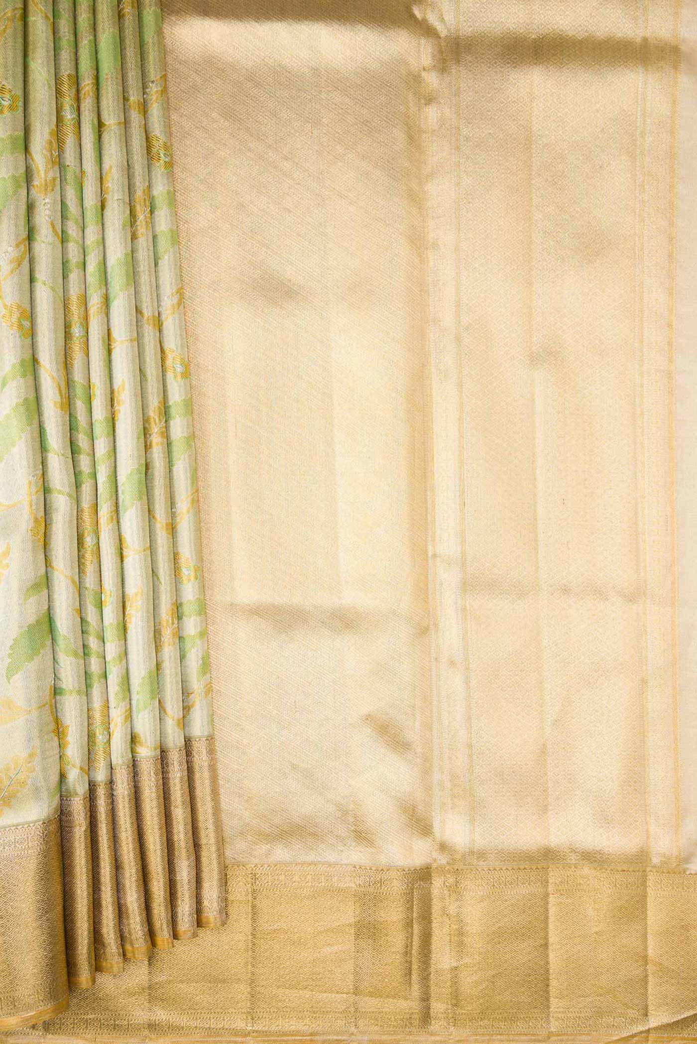 Pleats and pallu of Pista Green Dual Tone Kanjivaram Tissue Silk Saree with Zari Brocade on the body and Zari Border. 
