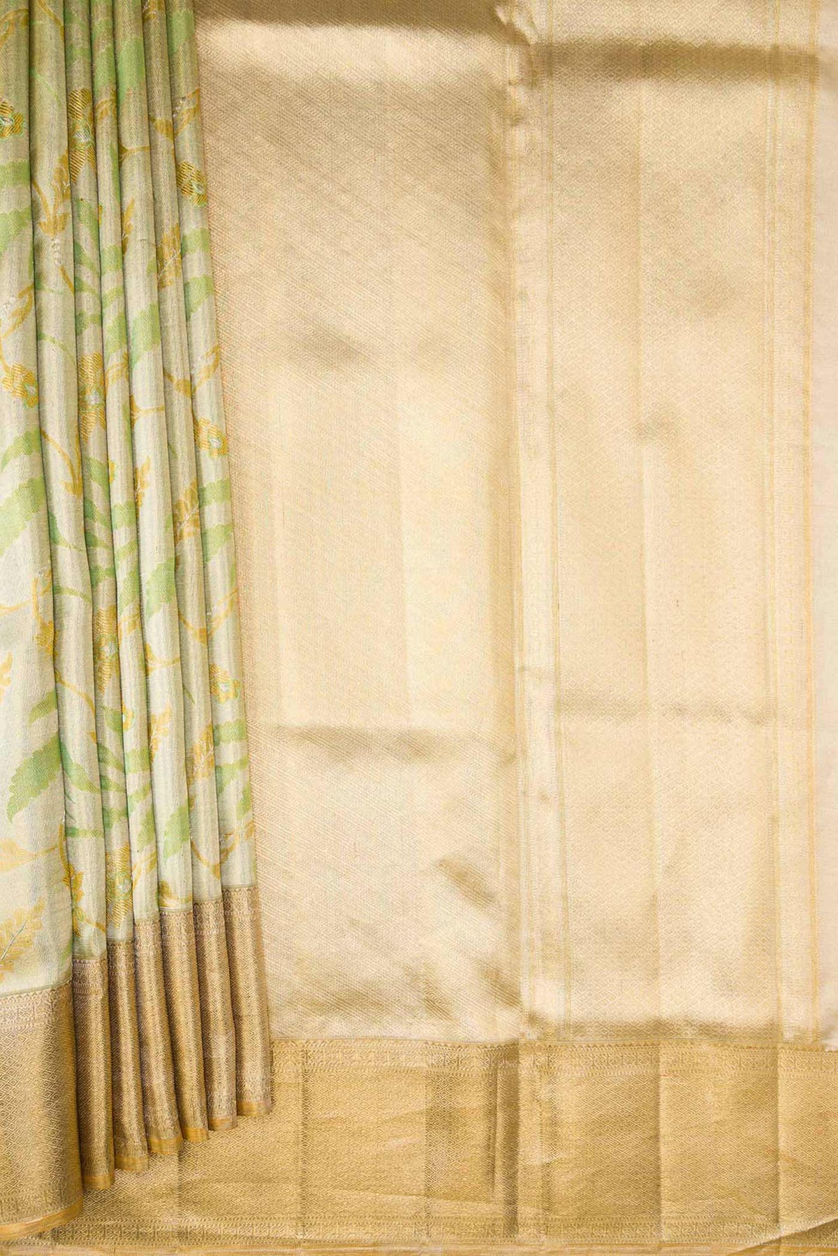 Pleats and pallu of Pista Green Dual Tone Kanjivaram Tissue Silk Saree with Zari Brocade on the body and Zari Border. 