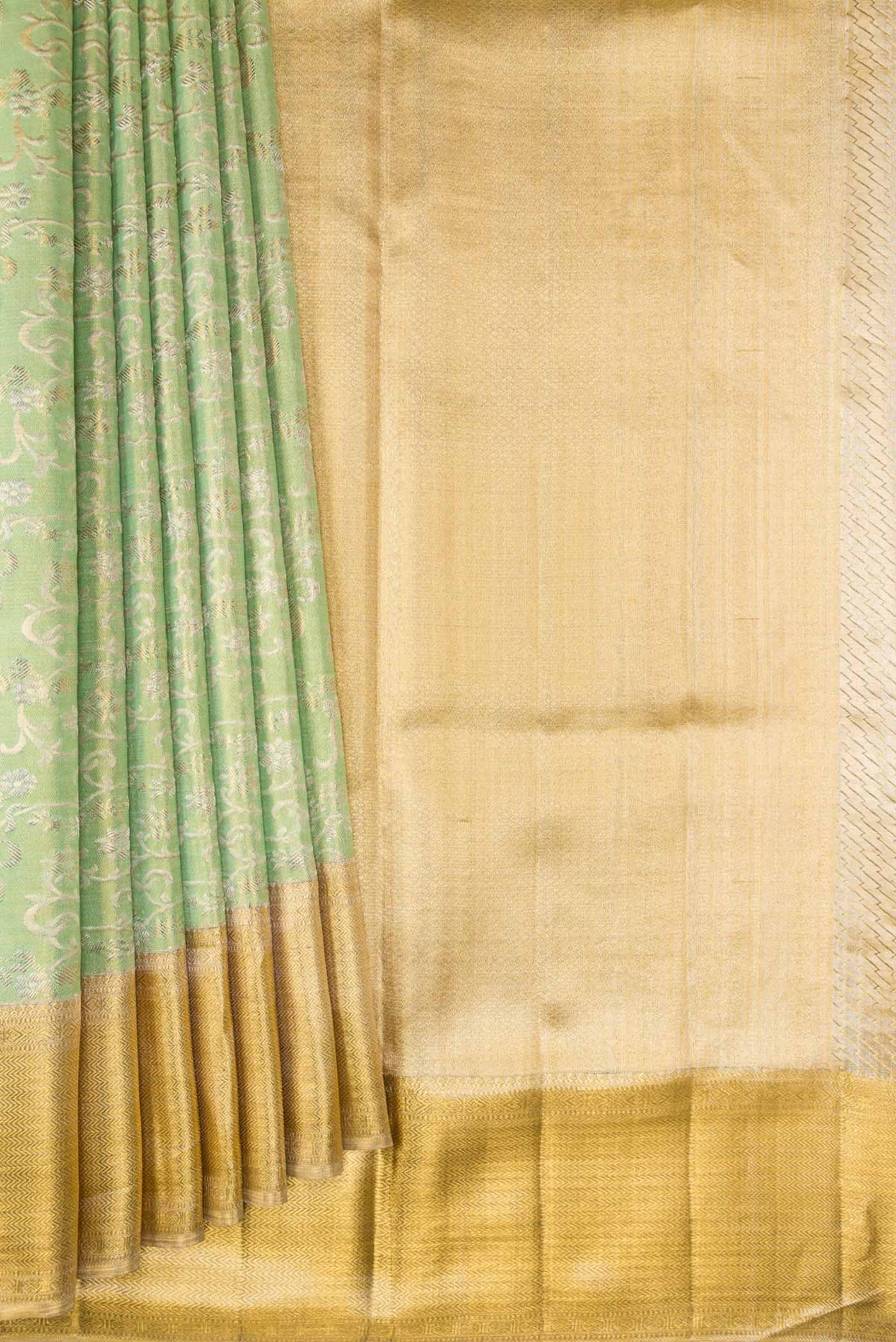 Pleats and pallu of Sea Green Dual Tone Kanjivaram Tissue Silk Saree with Zari Brocade on the body and Zari Border. 