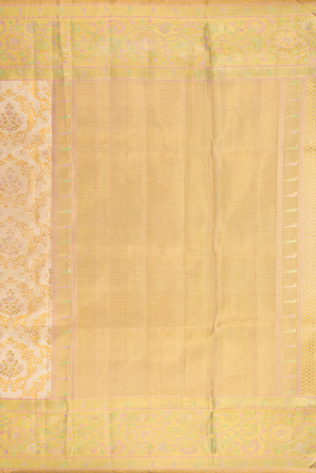 Close up image of the pallu of Gold Dual Tone Kanjivaram Tissue Silk Saree with Zari Brocade on the body and Fancy Border. 