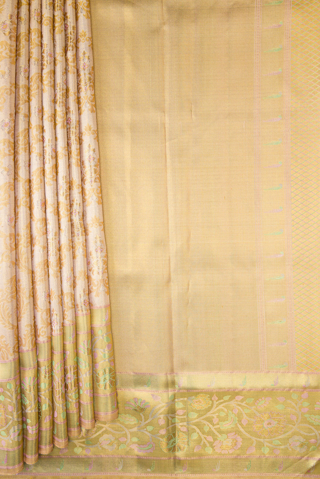 Pleats and pallu of Gold Dual Tone Kanjivaram Tissue Silk Saree with Zari Brocade on the body and Fancy Border. 