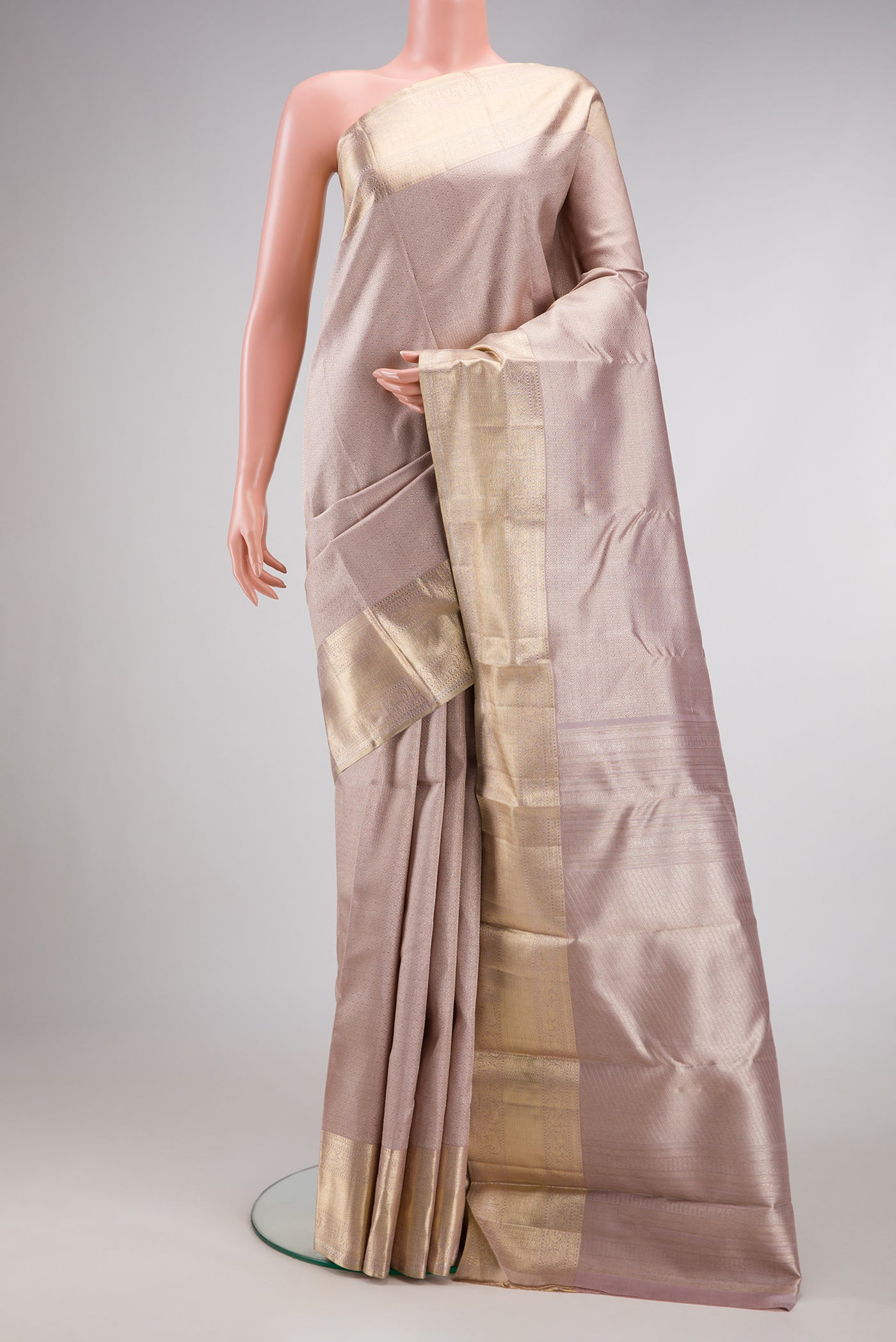 Pure Silk Pure Zari Lilac Dual Tone Kanchipuram Saree with Zari Brocade on the body and Zari Border.  displayed on a mannequin