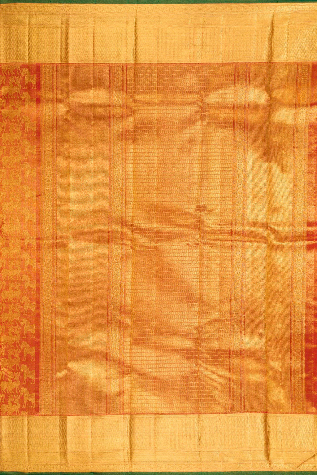 Close up image of the pallu of Maroon Dual Tone Kanjivaram Tissue Silk Saree with Zari Brocade on the body and Zari Border. 