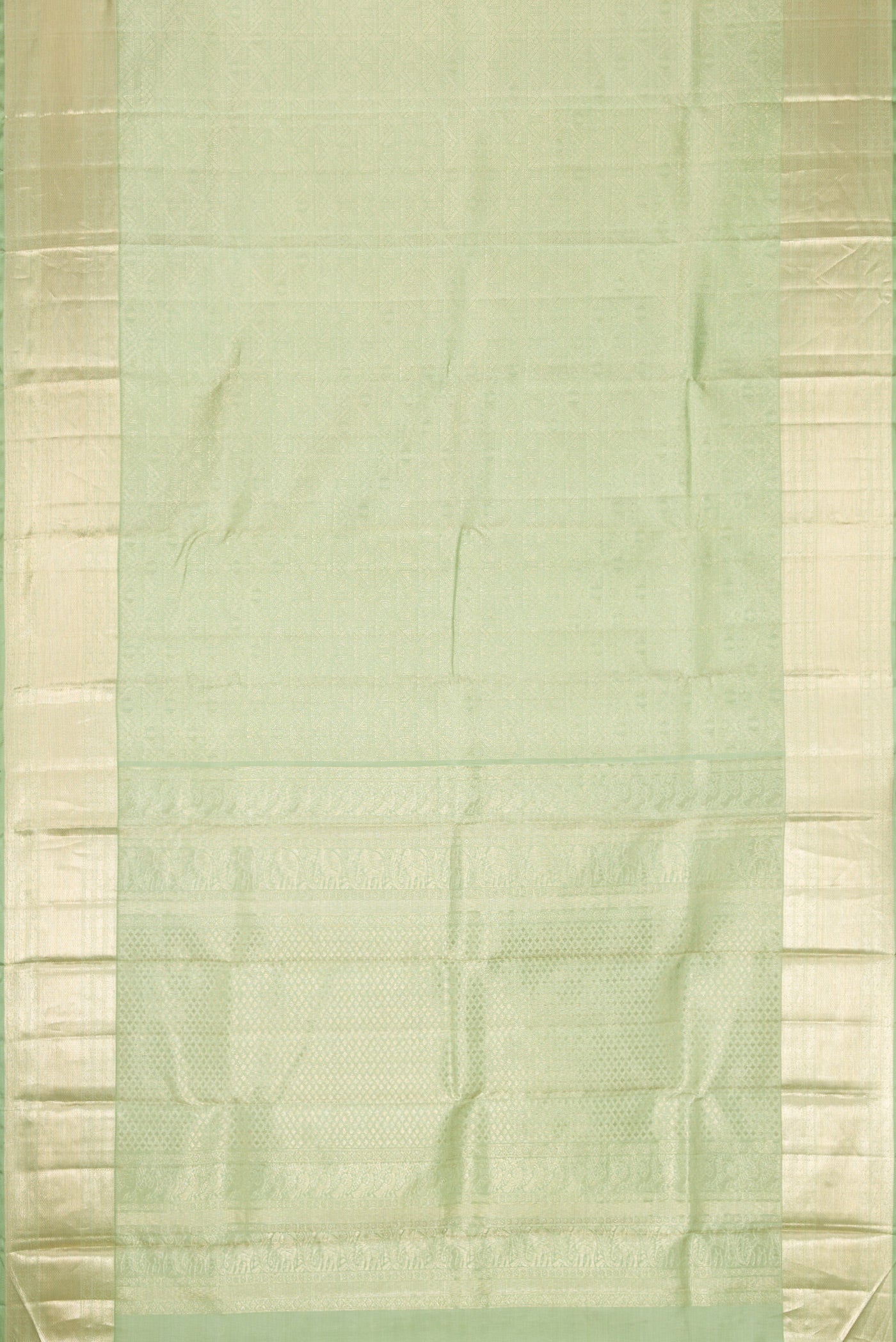 Flat view of Light Green Dual Tone Kanchipuram Silk Saree with Zari Brocade on the body and Zari Border. 