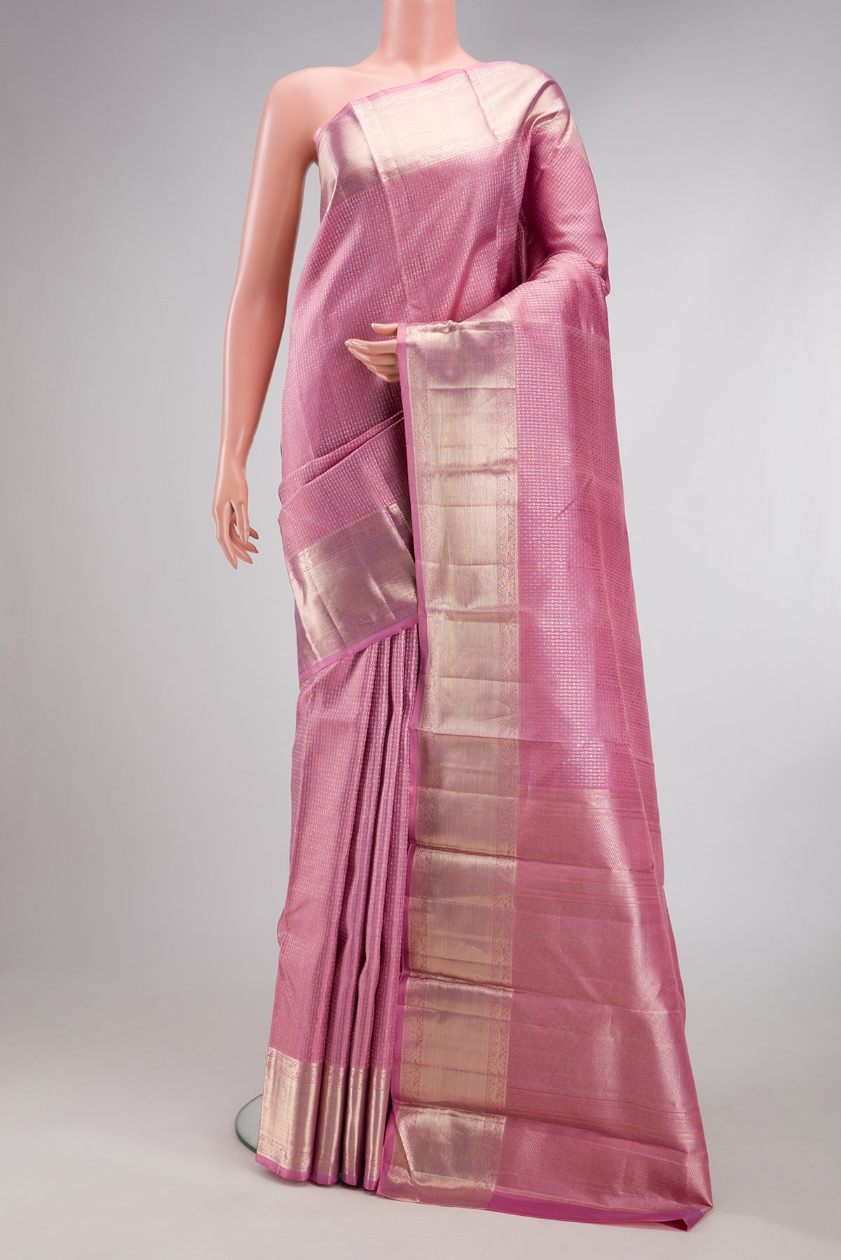 Pink Kanchipuram Silk Saree with Zari Brocade on the body and Zari Border.  displayed on a mannequin