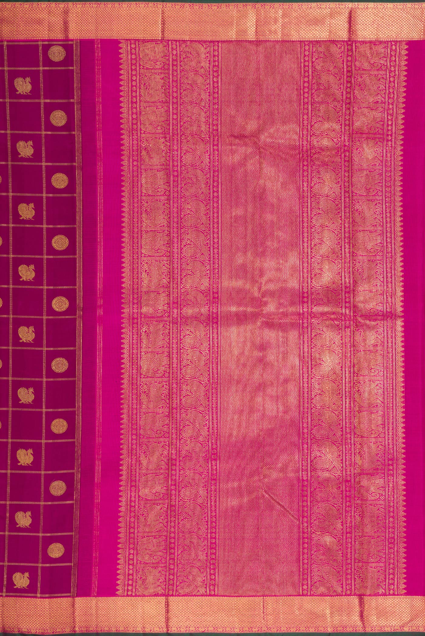 Close up image of the pallu of Pure Silk Pure Zari Magenta Dual Tone Kanjivaram Saree with Checked design on the body and Zari Border. 