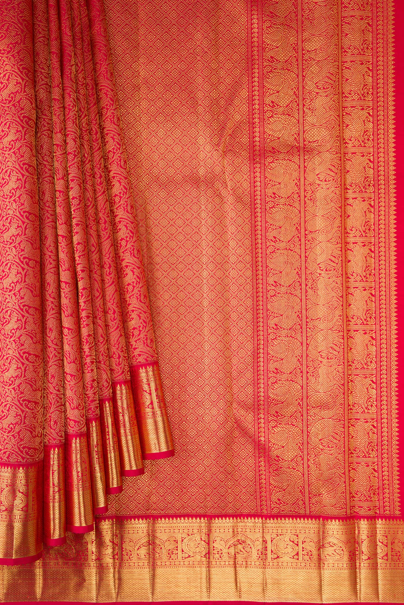 Pleats and pallu of Pure Silk Pure Zari Dark Pink Dual Tone Kanjivaram Saree with Zari Brocade on the body and Zari Border. 