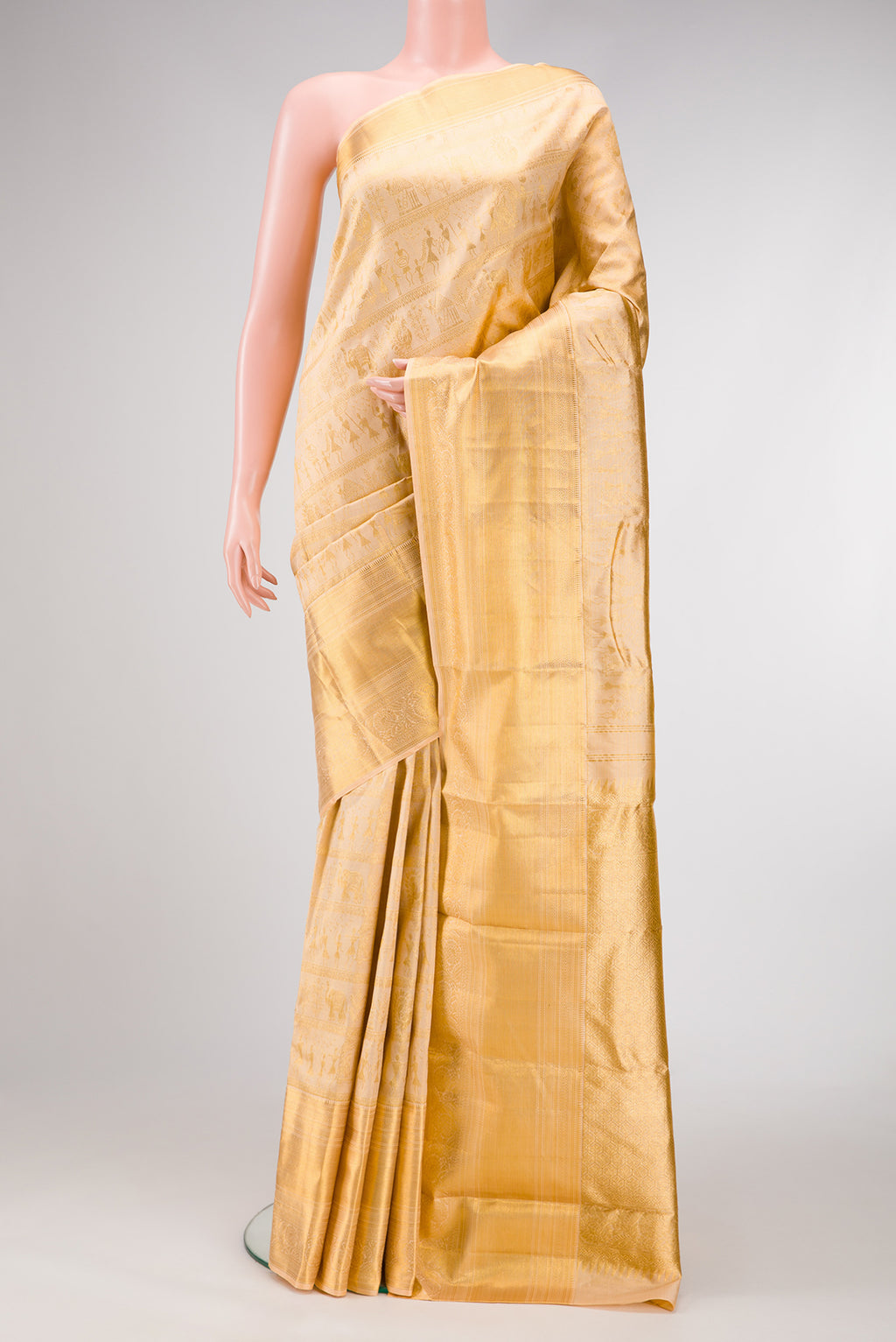 Rose Gold Dual Tone Kanchipuram Silk Saree with Zari Brocade on the body and Fancy Border.  displayed on a mannequin