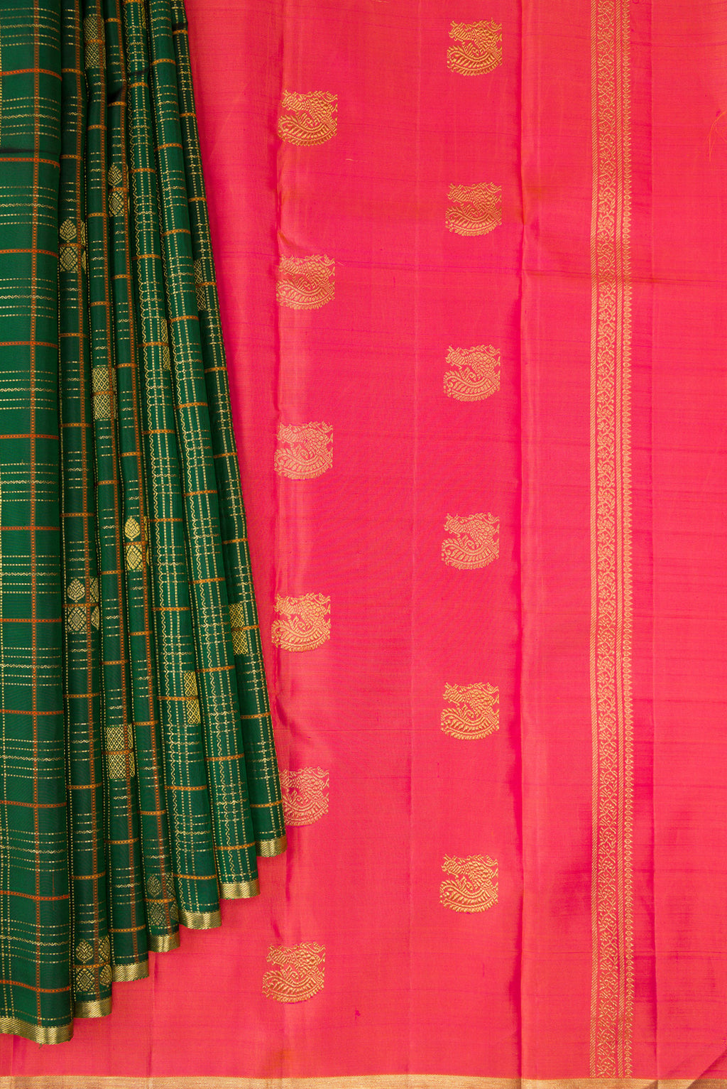 Pleats and pallu of Pure Silk Bottle Green Kanjivaram Saree with Checked design on the body and Zari Border. 