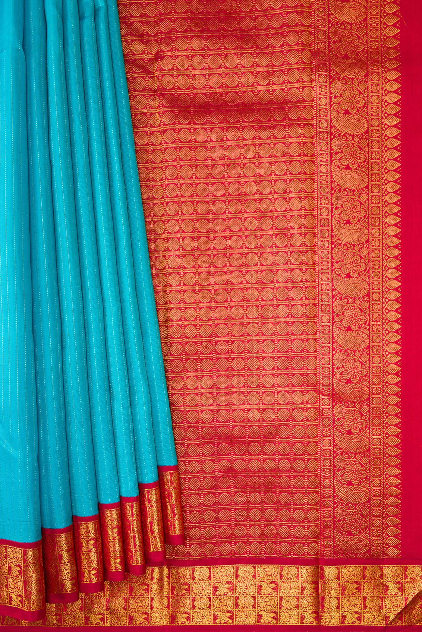 Pleats and pallu of Sky Blue Dual Tone Kanjivaram Silk Saree with Stripes on the body and Zari Border. 