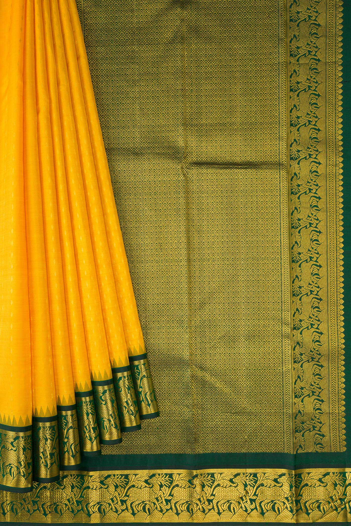 Pleats and pallu of Yellow Dual Tone Kanjivaram Silk Saree with Zari Butta on the body and Zari Border. 