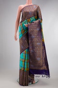 Pure Silk Pure Zari Multi Color Kanjivaram Saree with Checked design on the body and Fancy Border.  displayed on a mannequin