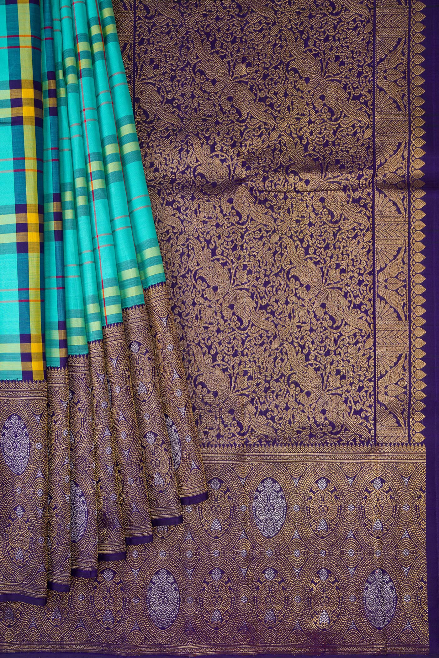 Pleats and pallu of Pure Silk Pure Zari Multi Color Kanjivaram Saree with Checked design on the body and Fancy Border. 