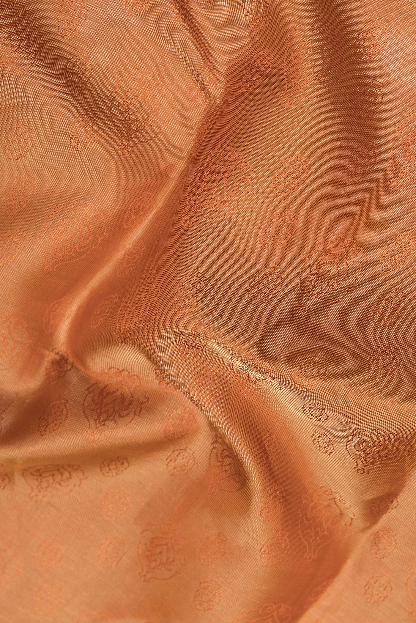 Close up of Mustard Dual Tone Kanchipuram Silk Saree with Jacquard design on the body and Zari Border.  displaying folds