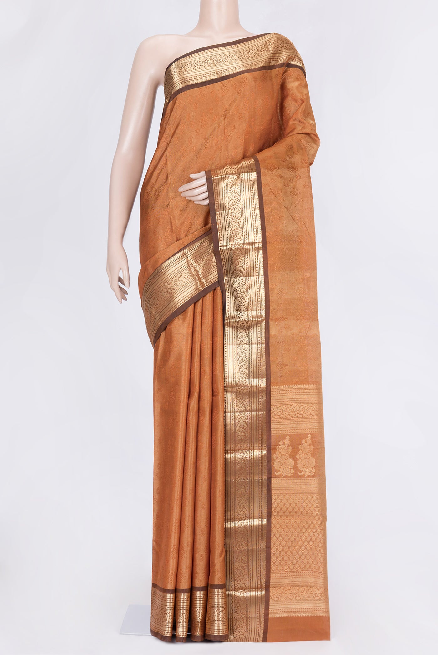 Mustard Dual Tone Kanchipuram Silk Saree with Jacquard design on the body and Zari Border.  displayed on a mannequin