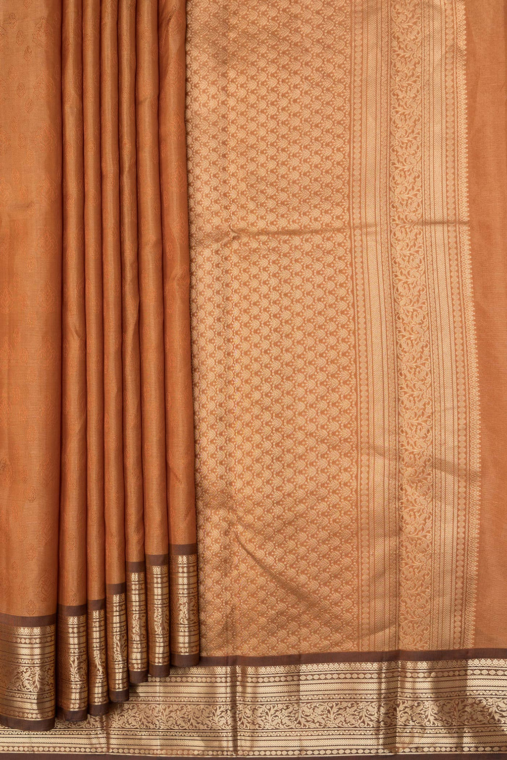 Pleats and pallu of Mustard Dual Tone Kanchipuram Silk Saree with Jacquard design on the body and Zari Border. 