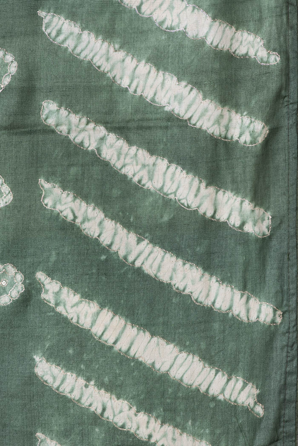 Border image of Mehandi Green Dual Tone Tussar Silk Saree with Embroidery on the body and Without Border. 
