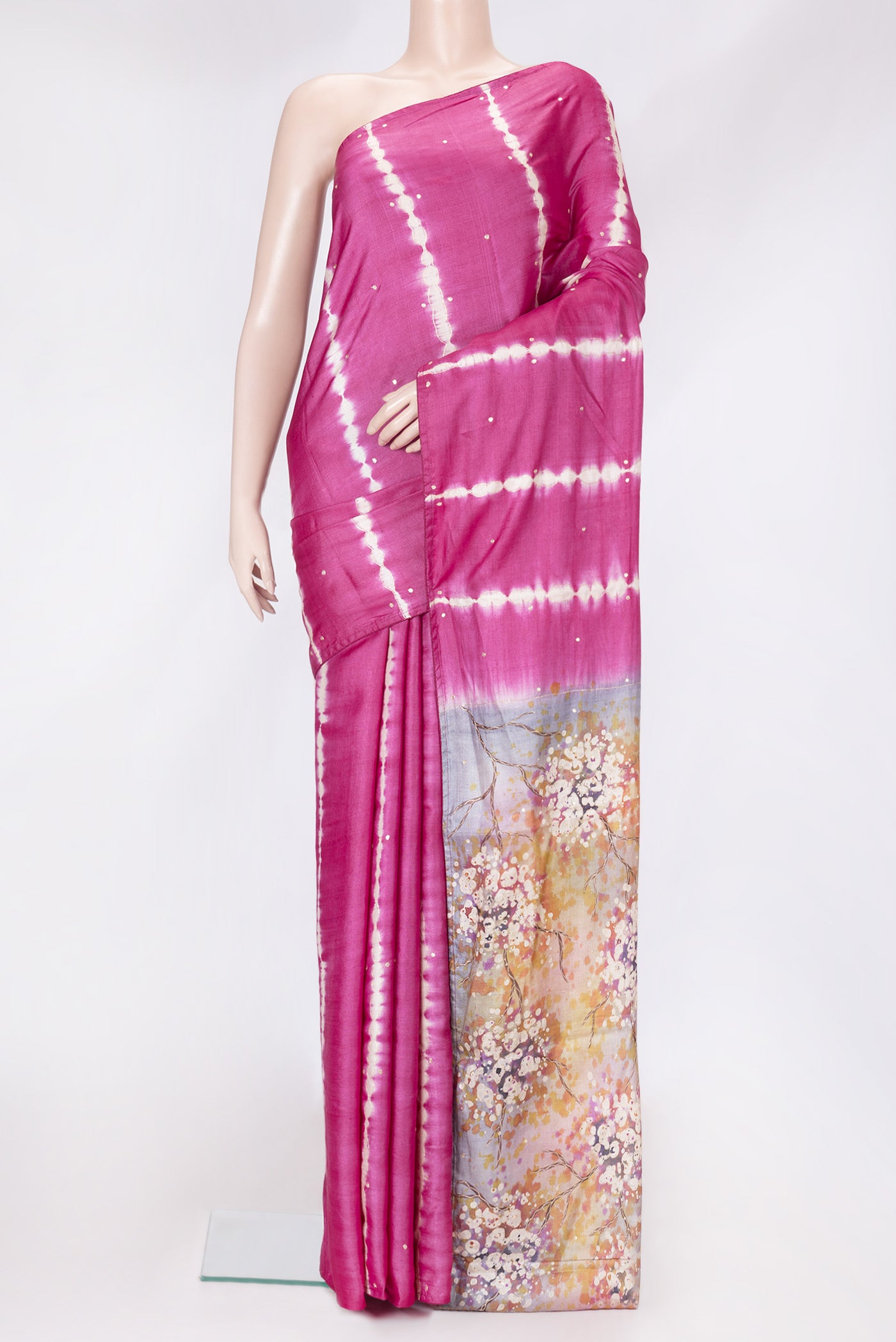 Pink Dual Tone Tussar Silk Saree with Embroidery on the body and Without Border.  displayed on a mannequin