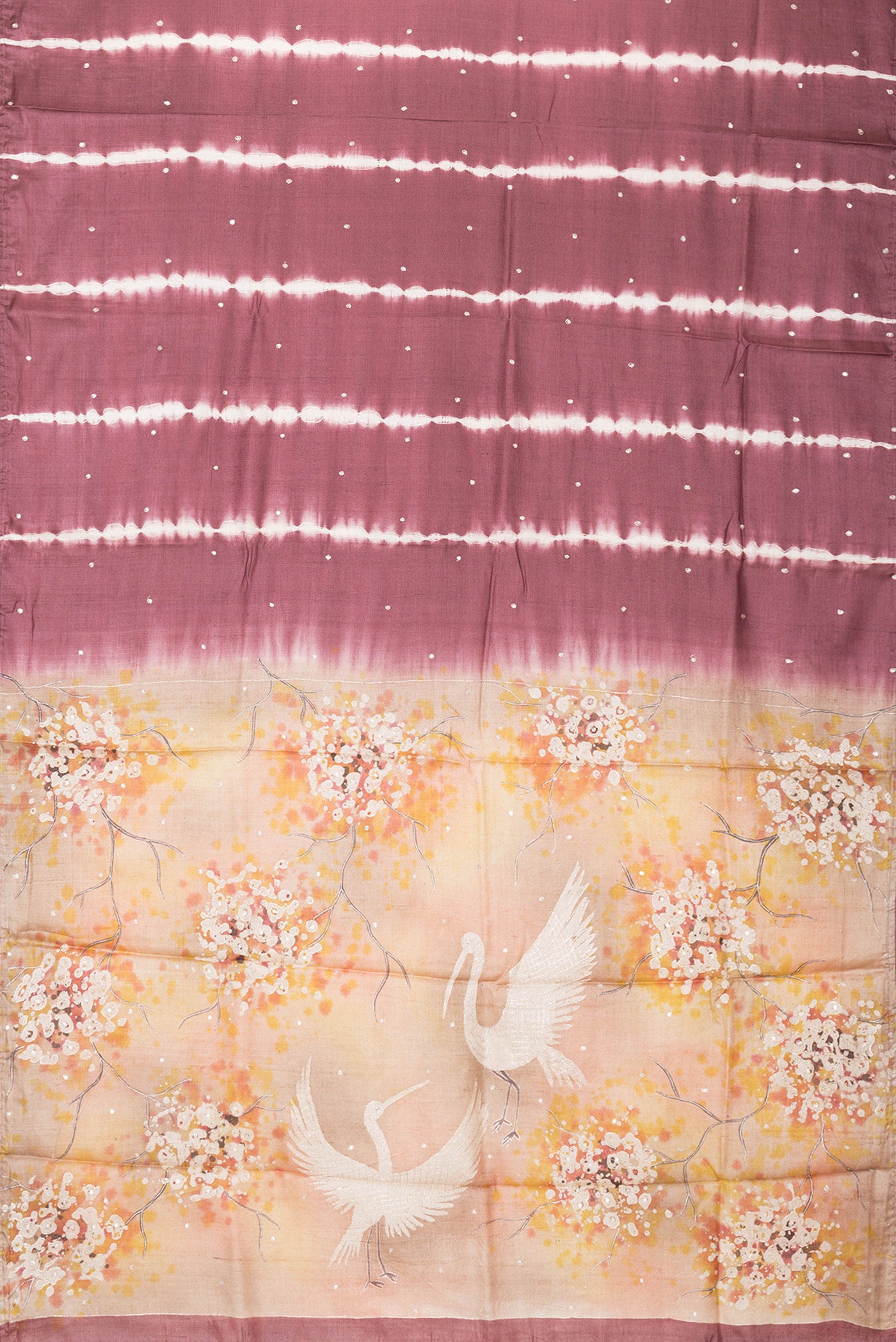 Flat view of Maroon Dual Tone Tussar Silk Saree with Embroidery on the body and Without Border. 