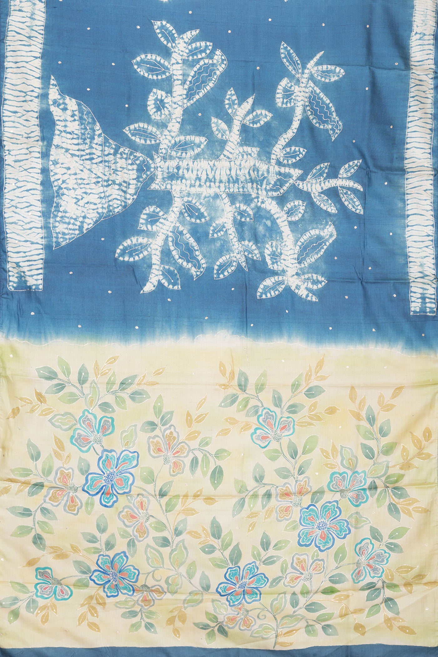 Flat view of Grey Dual Tone Tussar Silk Saree with Embroidery on the body and Fancy Border. 
