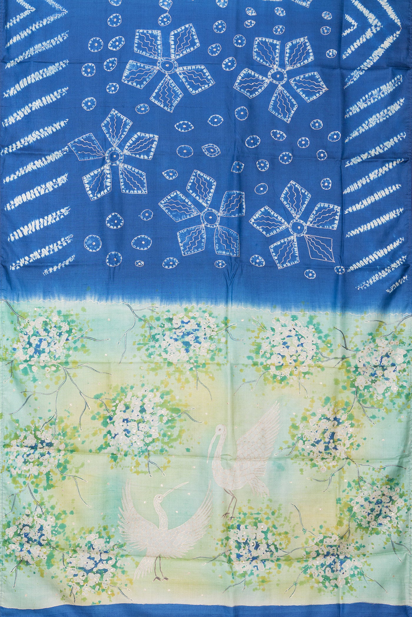 Flat view of Royal Blue Tussar Silk Saree with Embroidery on the body and Fancy Border. 