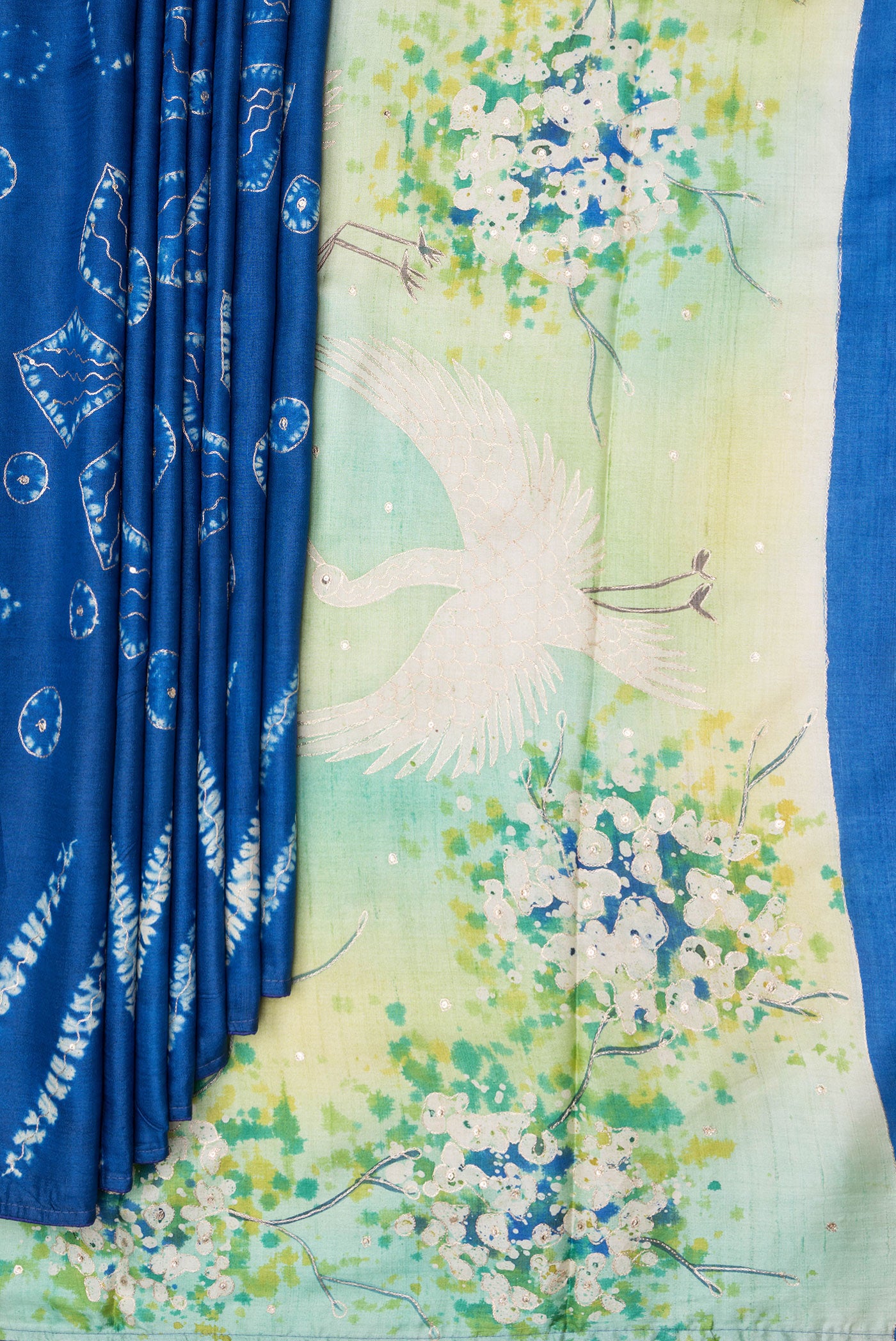 Pleats and pallu of Royal Blue Tussar Silk Saree with Embroidery on the body and Fancy Border. 