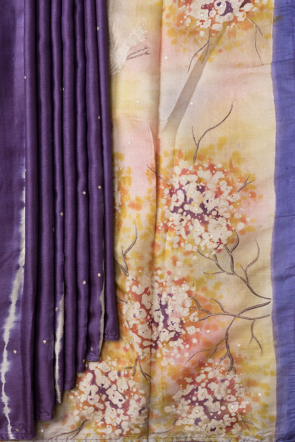 Pleats and pallu of Purple Dual Tone Tussar Silk Saree with Embroidery on the body and Without Border. 