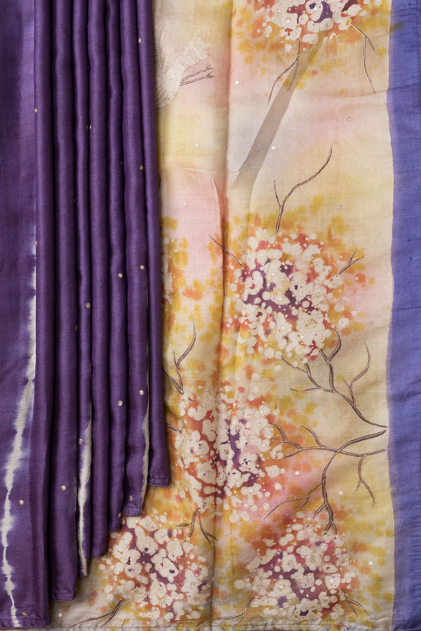 Pleats and pallu of Purple Dual Tone Tussar Silk Saree with Embroidery on the body and Without Border. 