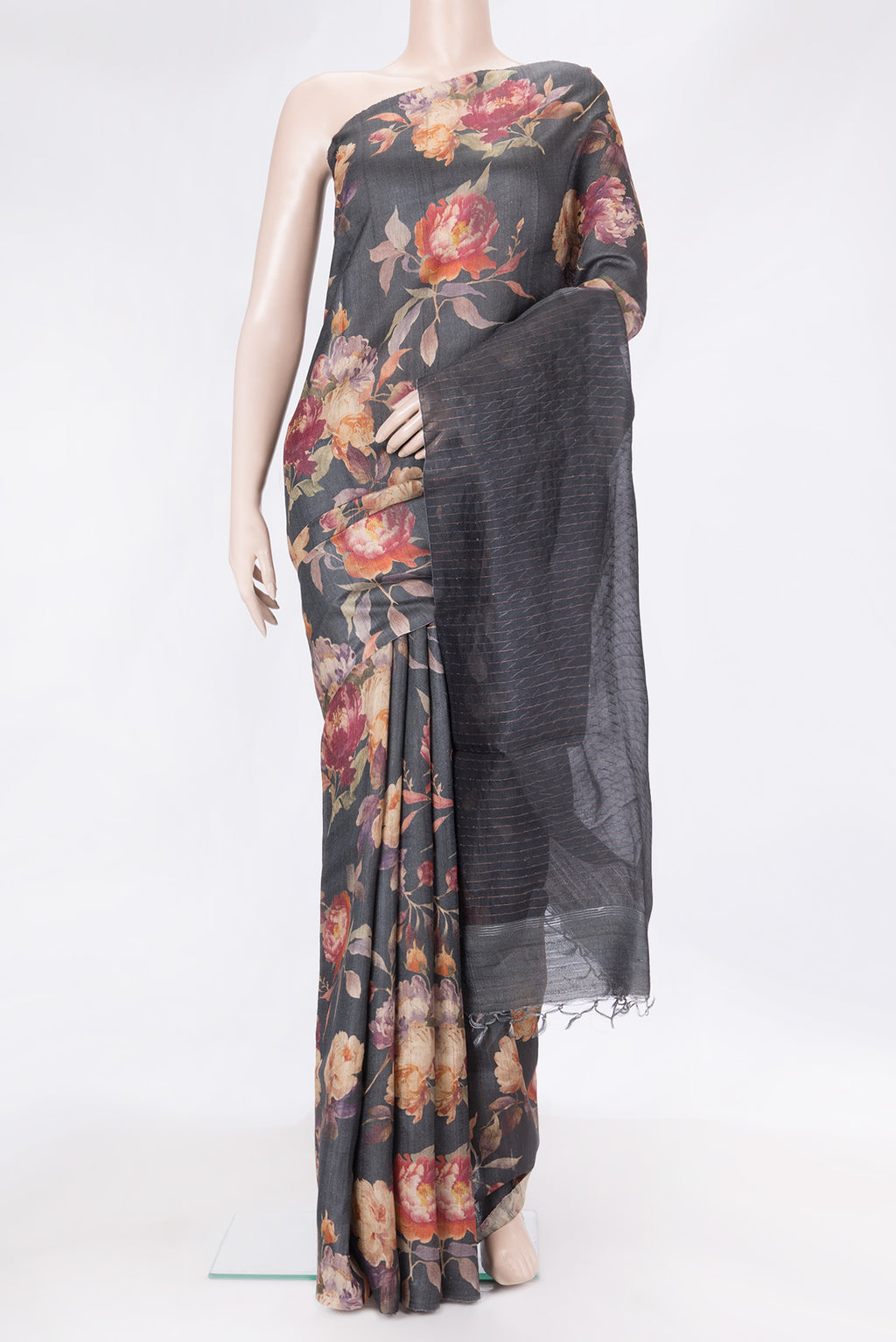 Black Dual Tone Tussar Silk Saree with Printed design on the body and Without Border.  displayed on a mannequin