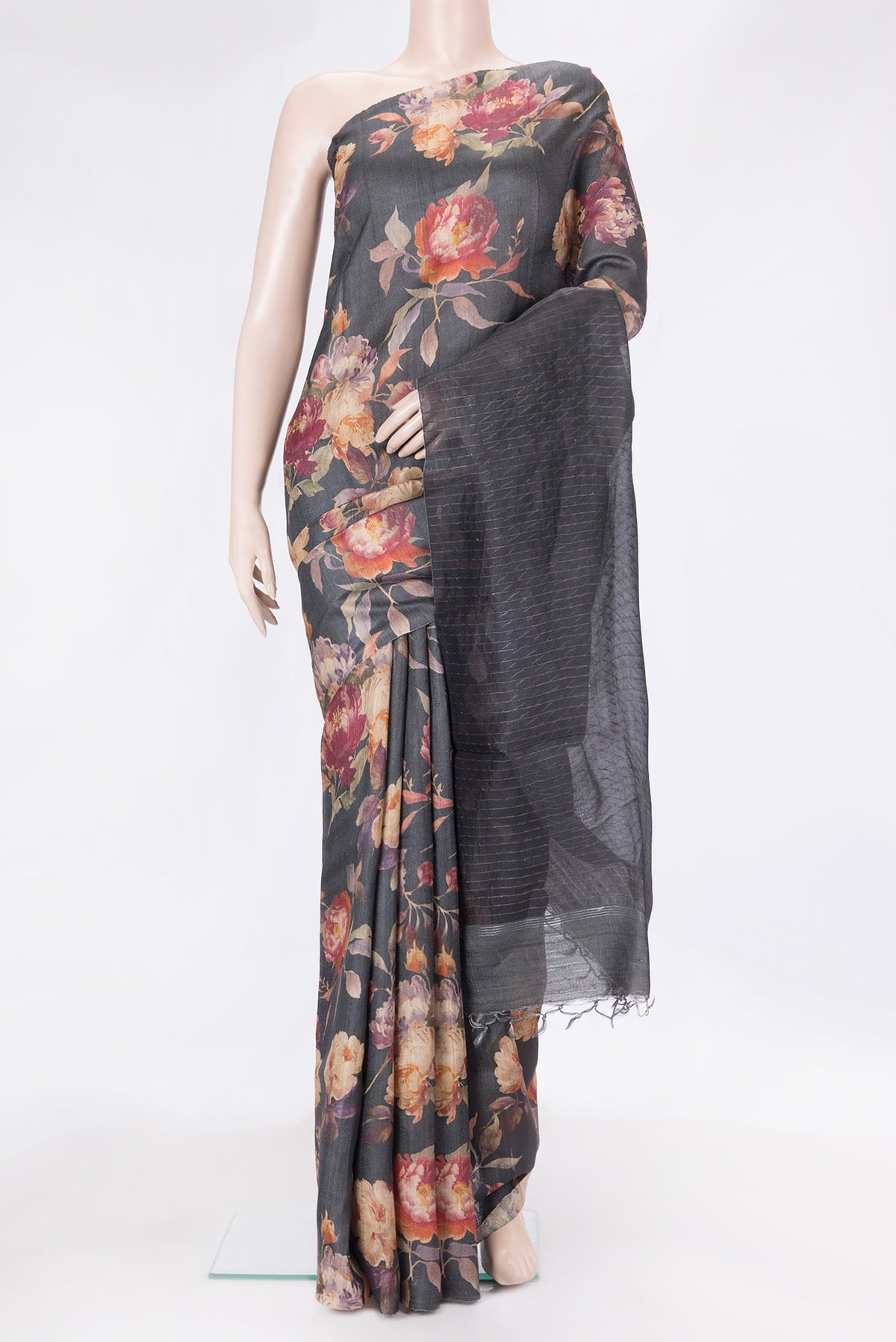 Black Dual Tone Tussar Silk Saree with Printed design on the body and Without Border.  displayed on a mannequin