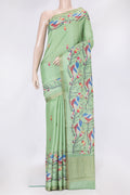 Green Dual Tone Tussar Silk Saree with Printed design on the body and Zari Border.  displayed on a mannequin
