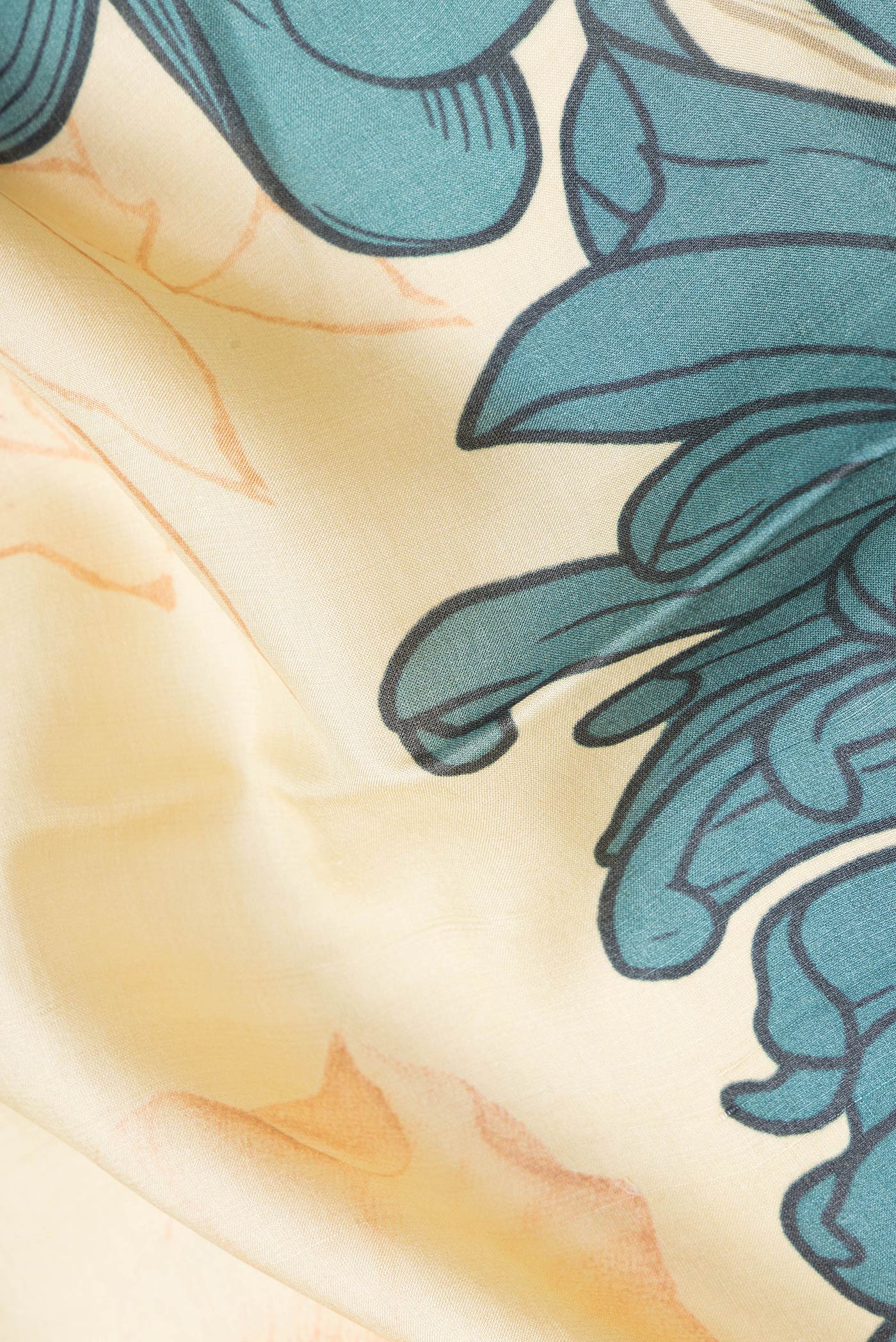 Close up of Sandal Dual Tone Tussar Silk Saree with Printed design on the body and Zari Border.  displaying folds
