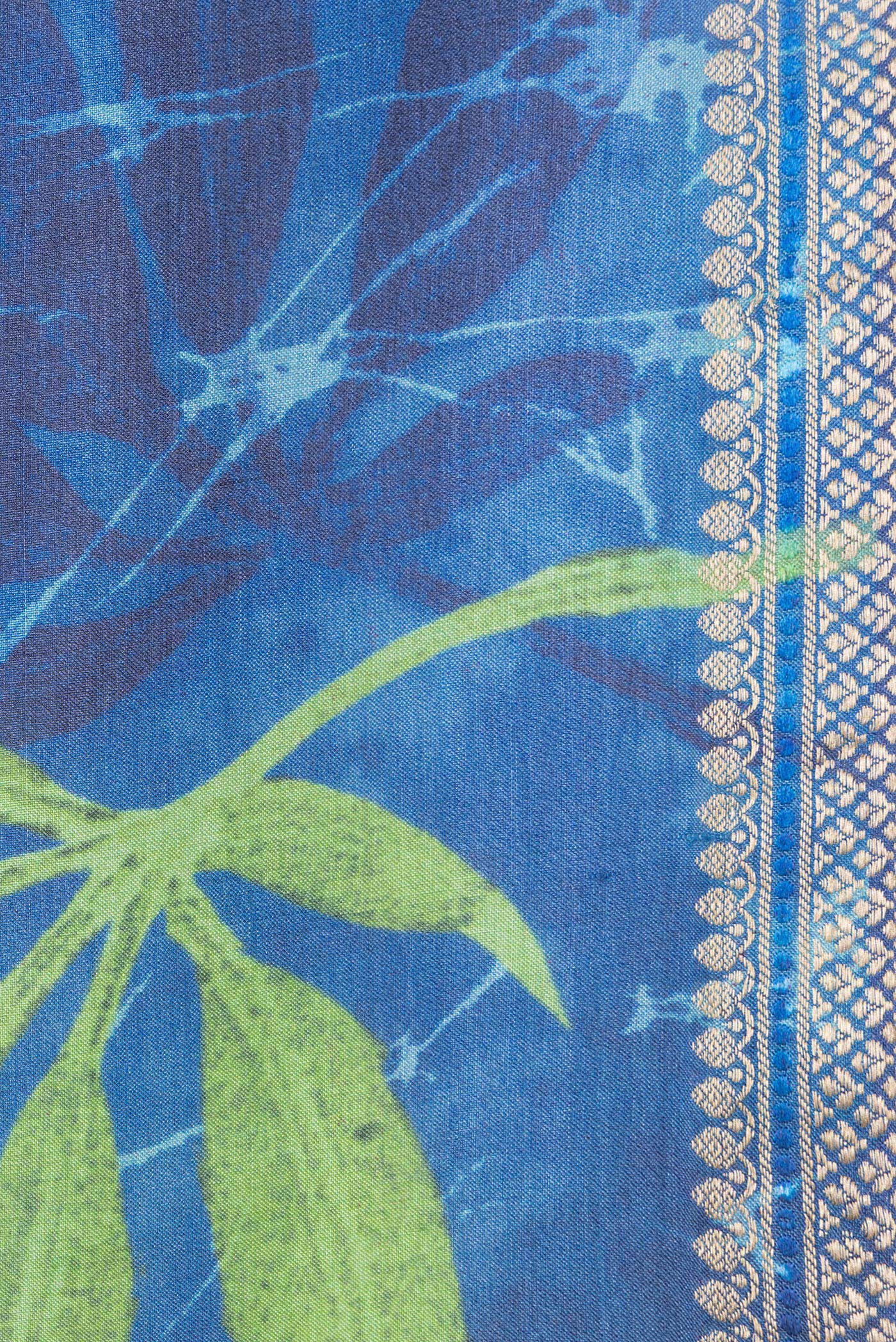 Border image of Peacock Blue Dual Tone Tussar Silk Saree with Printed design on the body and Zari Border. 