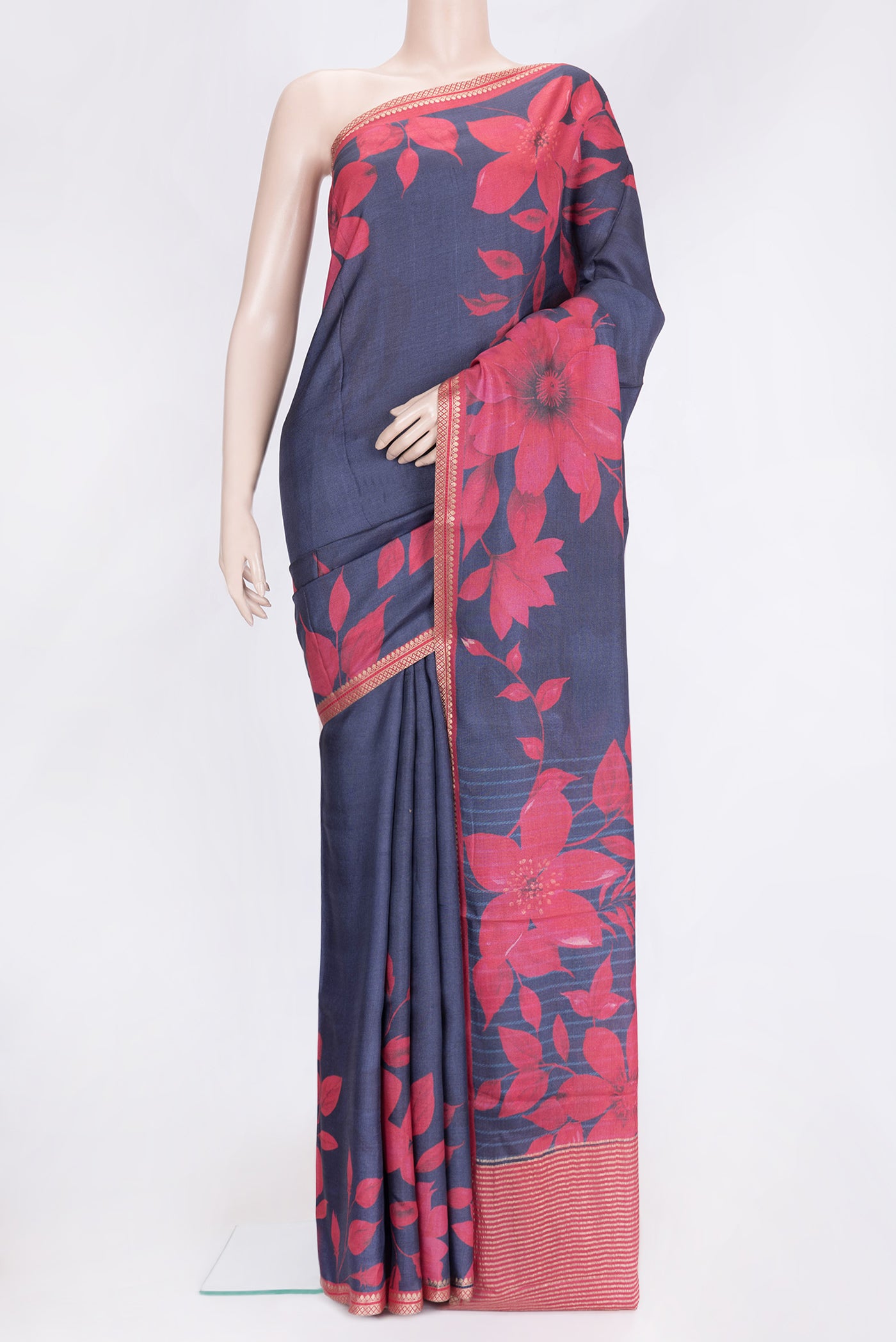 Navy Blue Dual Tone Tussar Silk Saree with Printed design on the body and Zari Border.  displayed on a mannequin