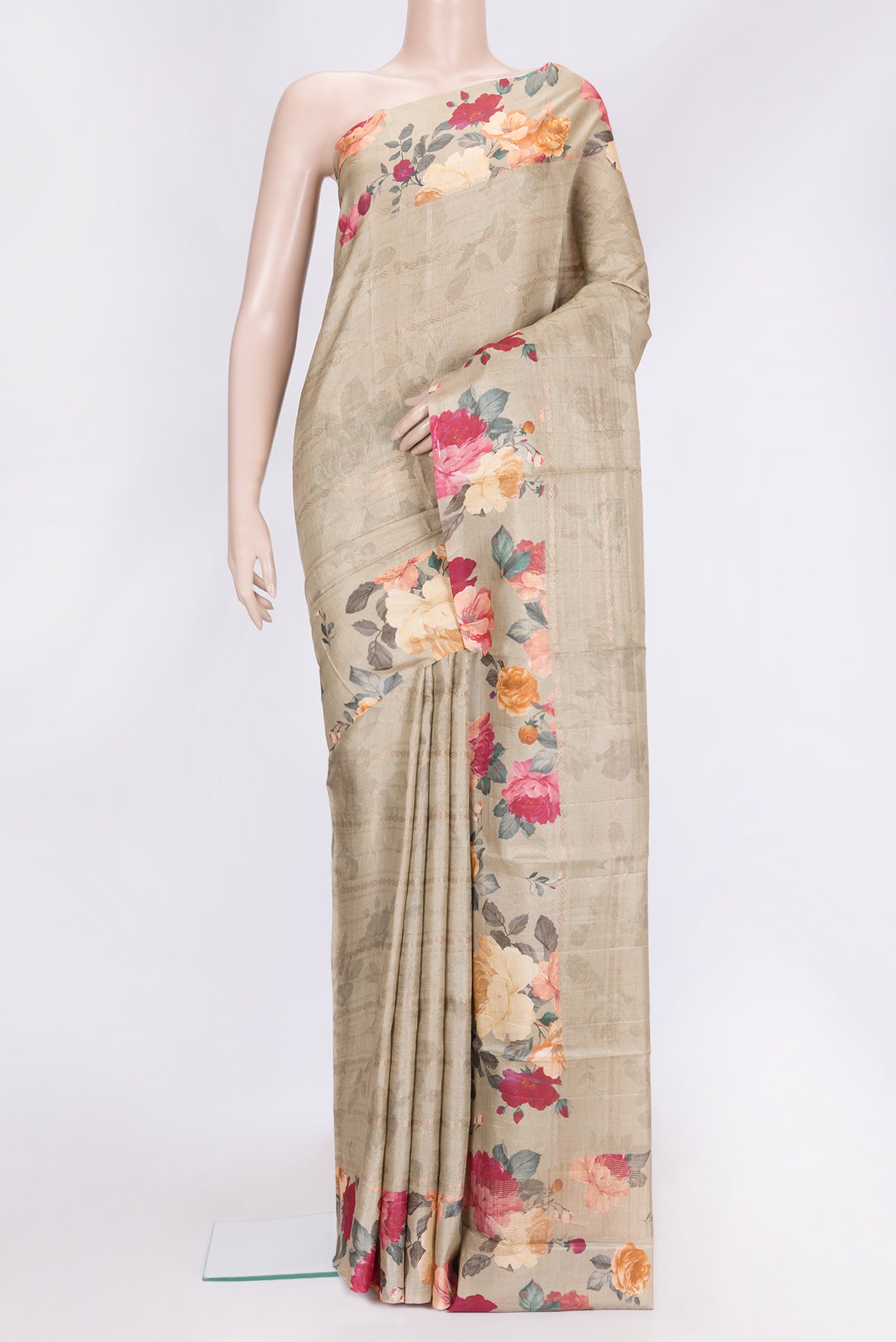 Beige Dual Tone Tussar Silk Saree with Stripes on the body and Printed Border.  displayed on a mannequin