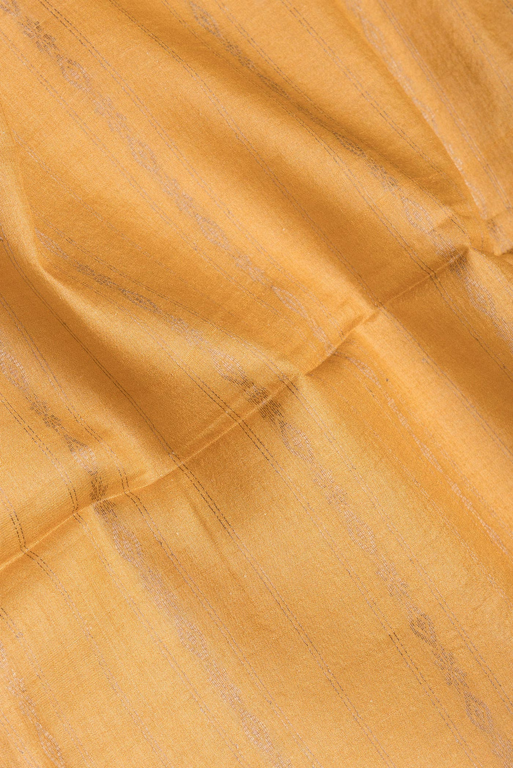 Close up of Sandal Tussar Silk Saree with Stripes on the body and Fancy Border.  displaying folds